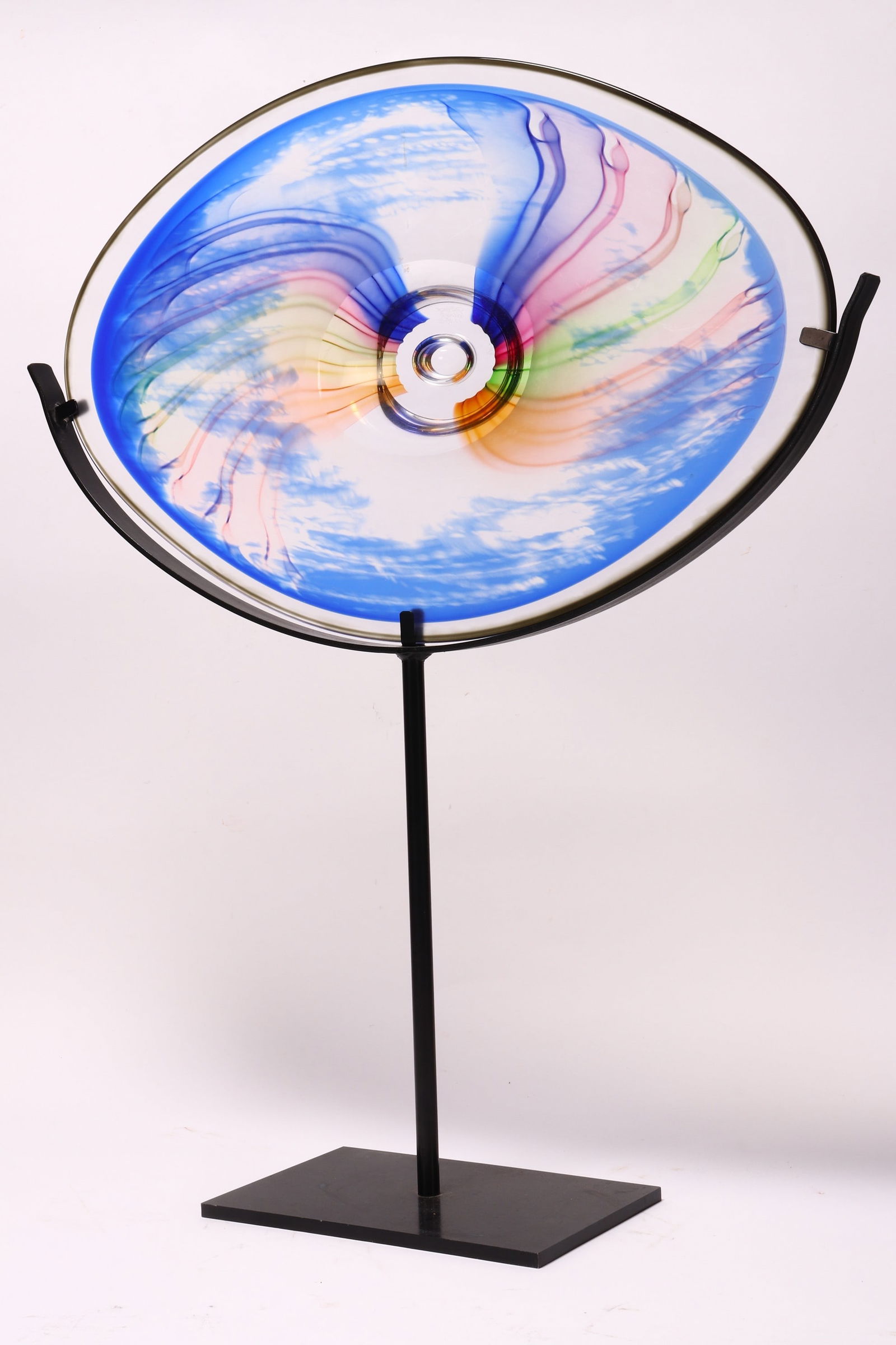 Large Goran Warff (Swedish, 1933-2022) Glass Centre Piece and Stand,: c.2012, of elongated oval form, with a frosted blue, pink and green glass top, above a swirled glass base, signed and dated 12.09.12, Sydney verso, length 64cm, with stand (2)