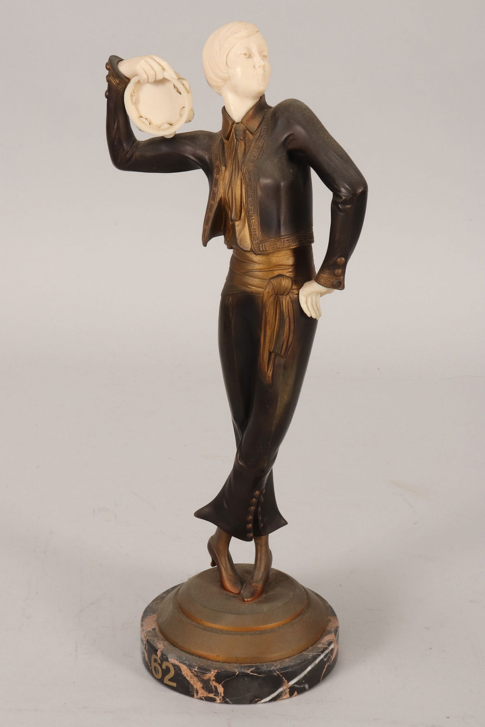Paul Philippe (French, 1870-1930),: The Tambourine Player, c.1925 cold painted, on marble base signed 'Philippe R.M' to base height 36cm Shipping Note: this item can ONLY be shipped within Australia, we are unable to ship to overseas bu