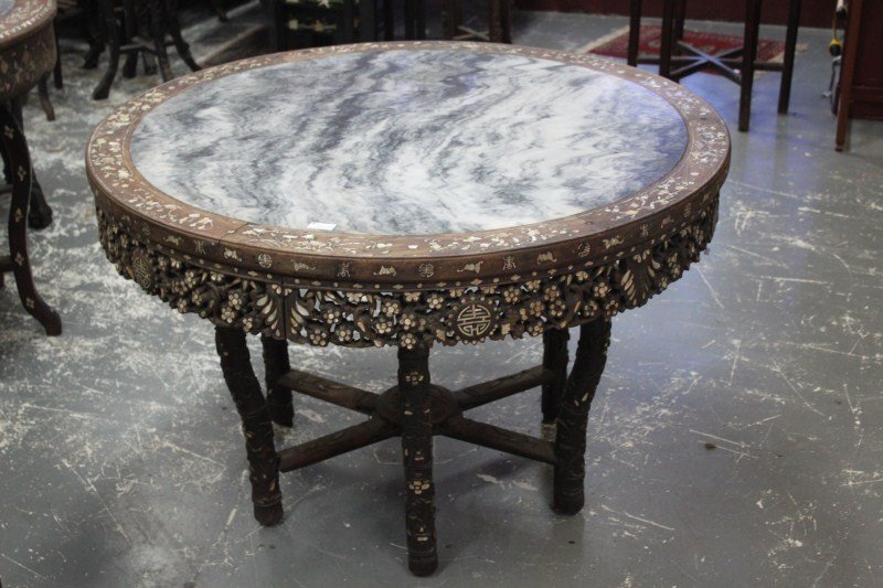 Large Chinese Qing Dynasty Marble and Mother of: Pearl Inlay Table, with circular marble top, surrounded by flowers, symbols and bats in mother of pearl on a folding six leg base