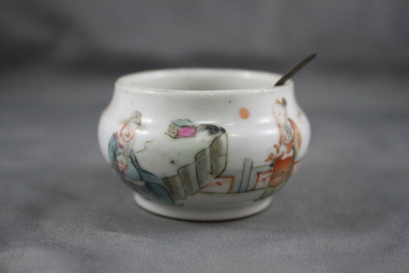Chinese Qing Dynasty, 18th Century Porcelain: Salt and Spoon, of squat form, decorated with scholar and child in tones of blue, orange and green, d 6cm Provenance: This item is one of the several HENG Family's collections of Chinese Antiques and