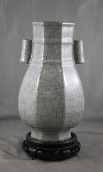 Chinese Late Qing Dynasty, Celadon Crackle Glaze: Arrow Vase, of facetted baluster form, in a pale green glaze in crackle finish, on stand, h 18cm Provenance: This item is one of the several HENG Family's collections of Chinese Antiques and other fin