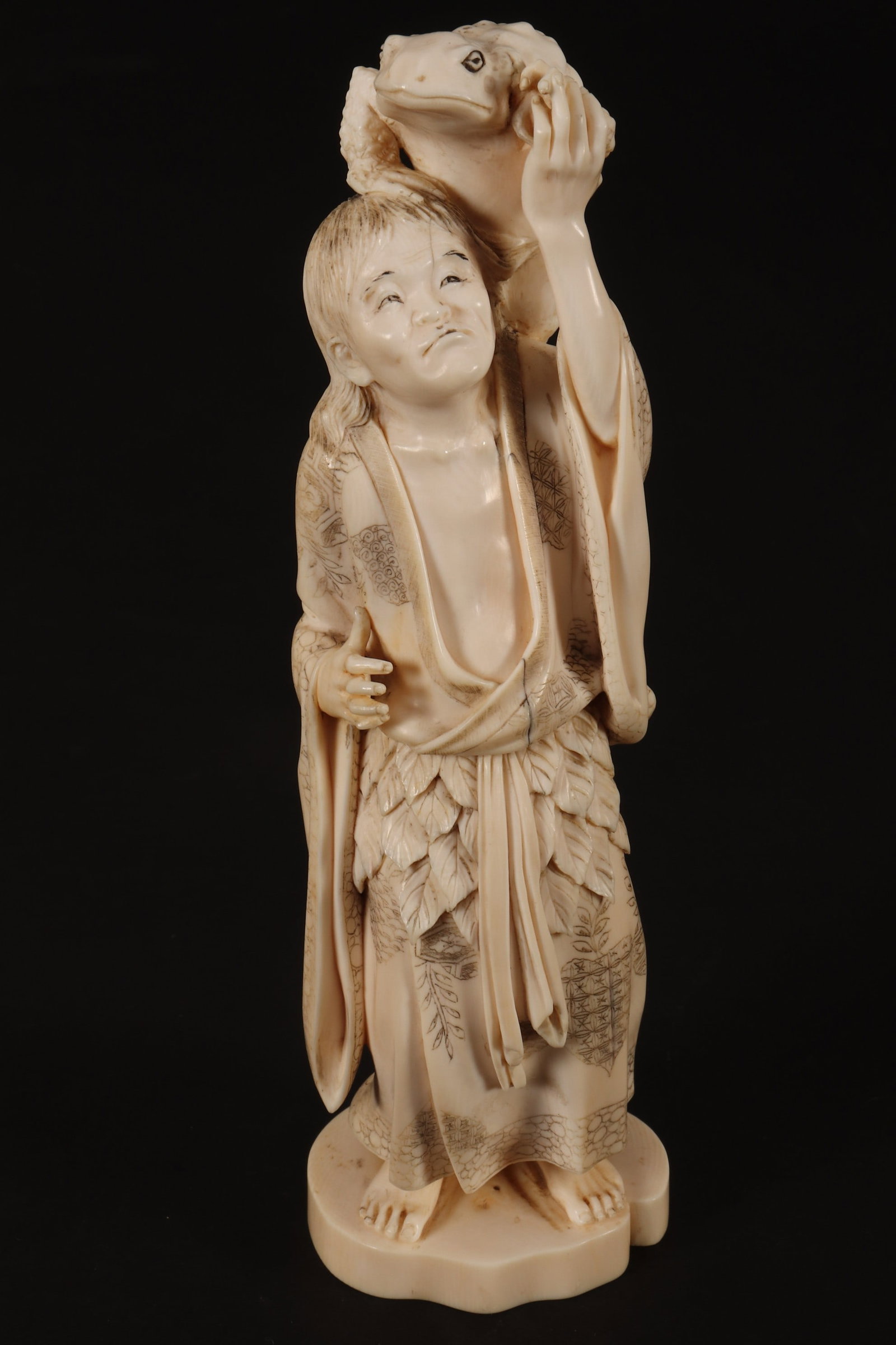 Lovely Japanese Meiji Period Figure Group,: depicting Gamma Sennin with toad perched on the head and shoulder, with decorative robes, signed verso, height 20cm Please note: this item can only be shipped WITHIN Australia.