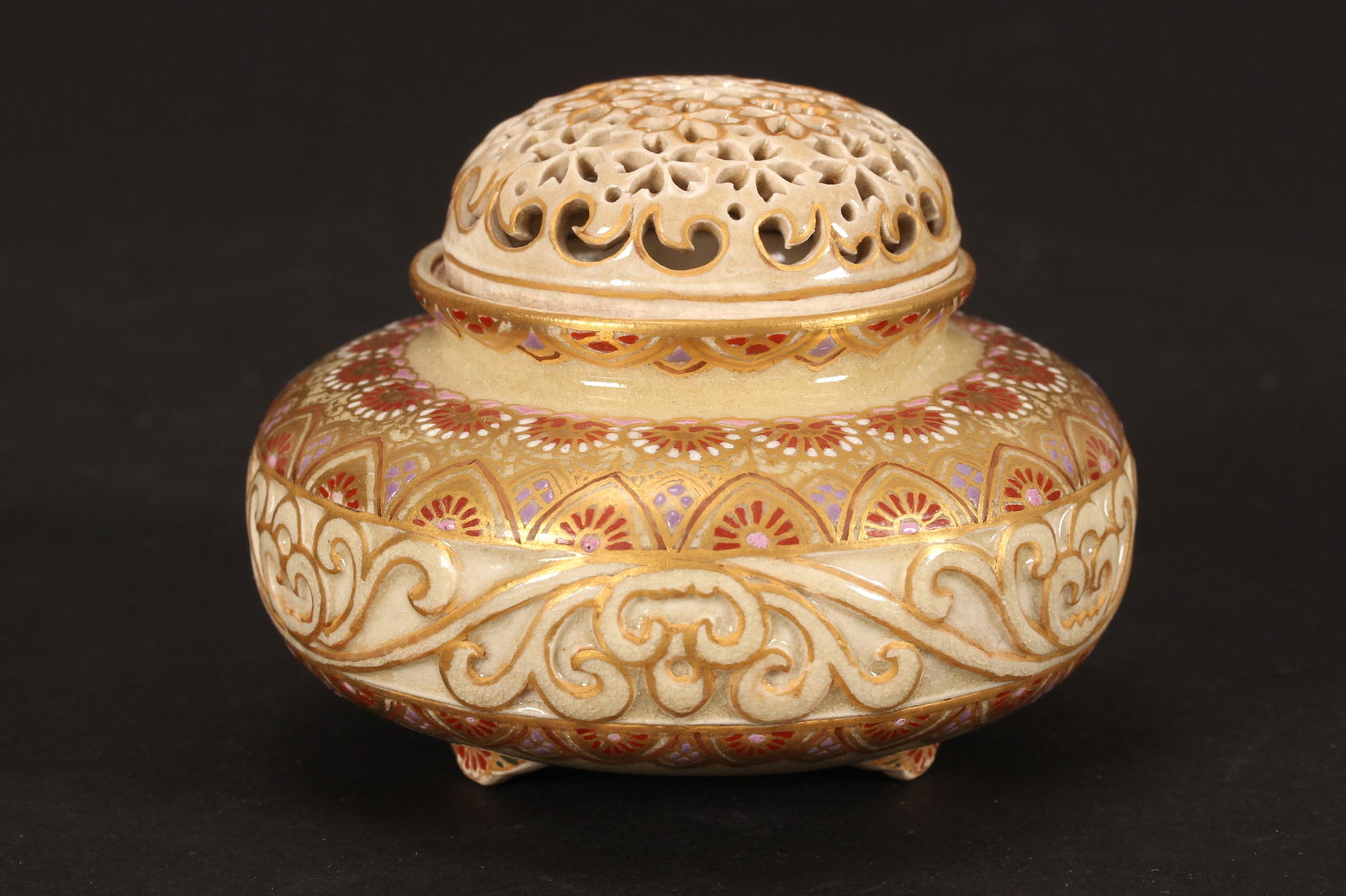 Japanese Satsuma Lidded Koro,: of squat form, decorated with acanthus frieze in relief. on a gilt brocade ground, four character mark to base, height 8cm and width 9.5cm