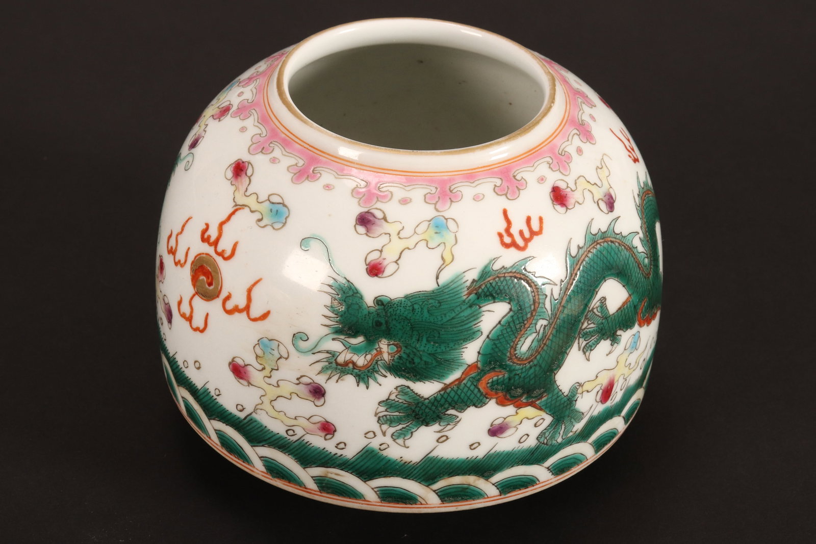 Chinese Famille Vert Porcelain Water Pot,: of domed form, the body decorated with two dragons in pursuit of the flaming pearl amongst stylised clouds, above turbulent waves, six character mark to base, height 6.5cm