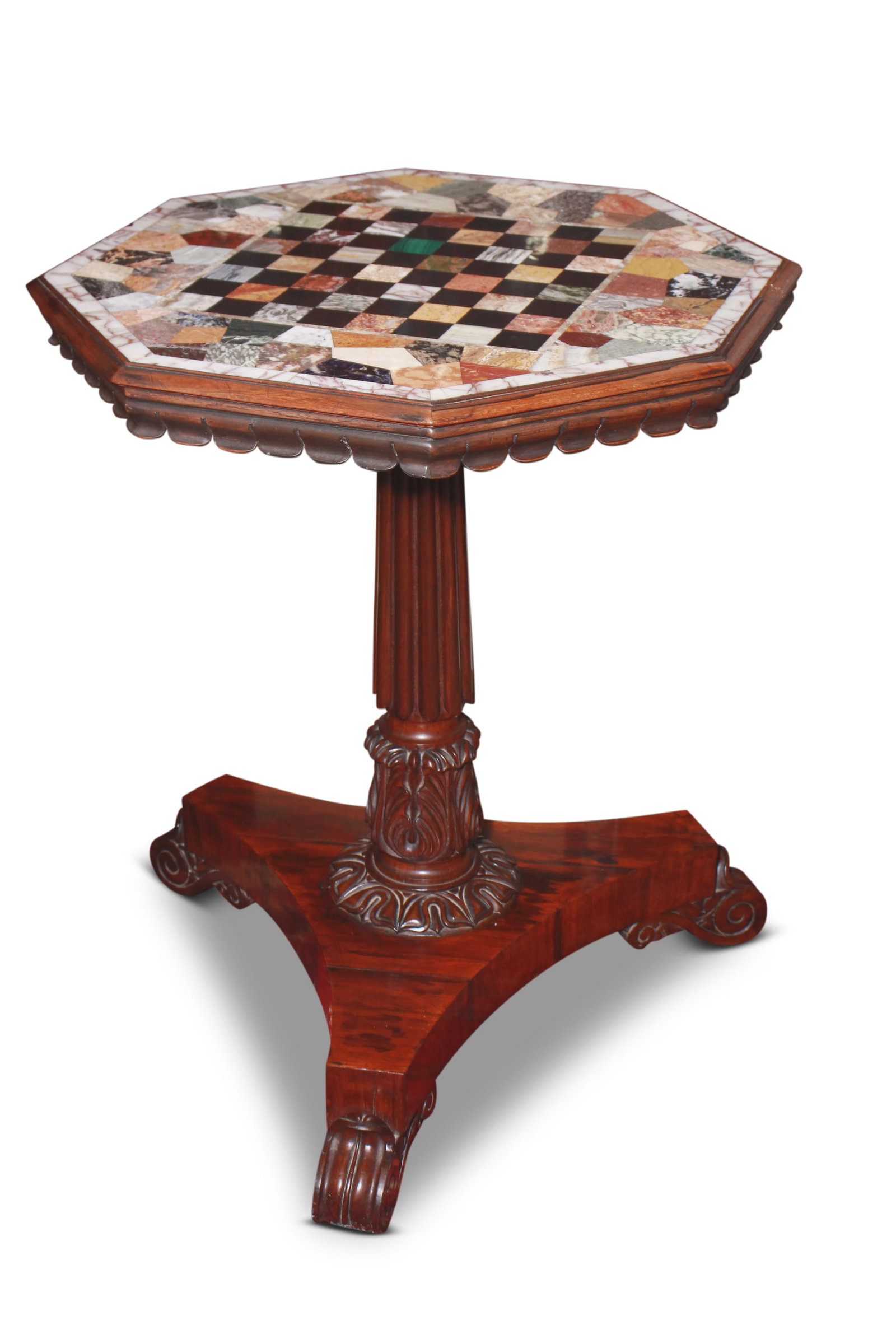 Beautiful Irish William IV Specimen Occasional Table,: in rosewood, with an octagonal top, set with a central checkerboard and surround, set with stone specimens, above a scalloped apron, on a well reeded tapering support accented with acanthus carving on