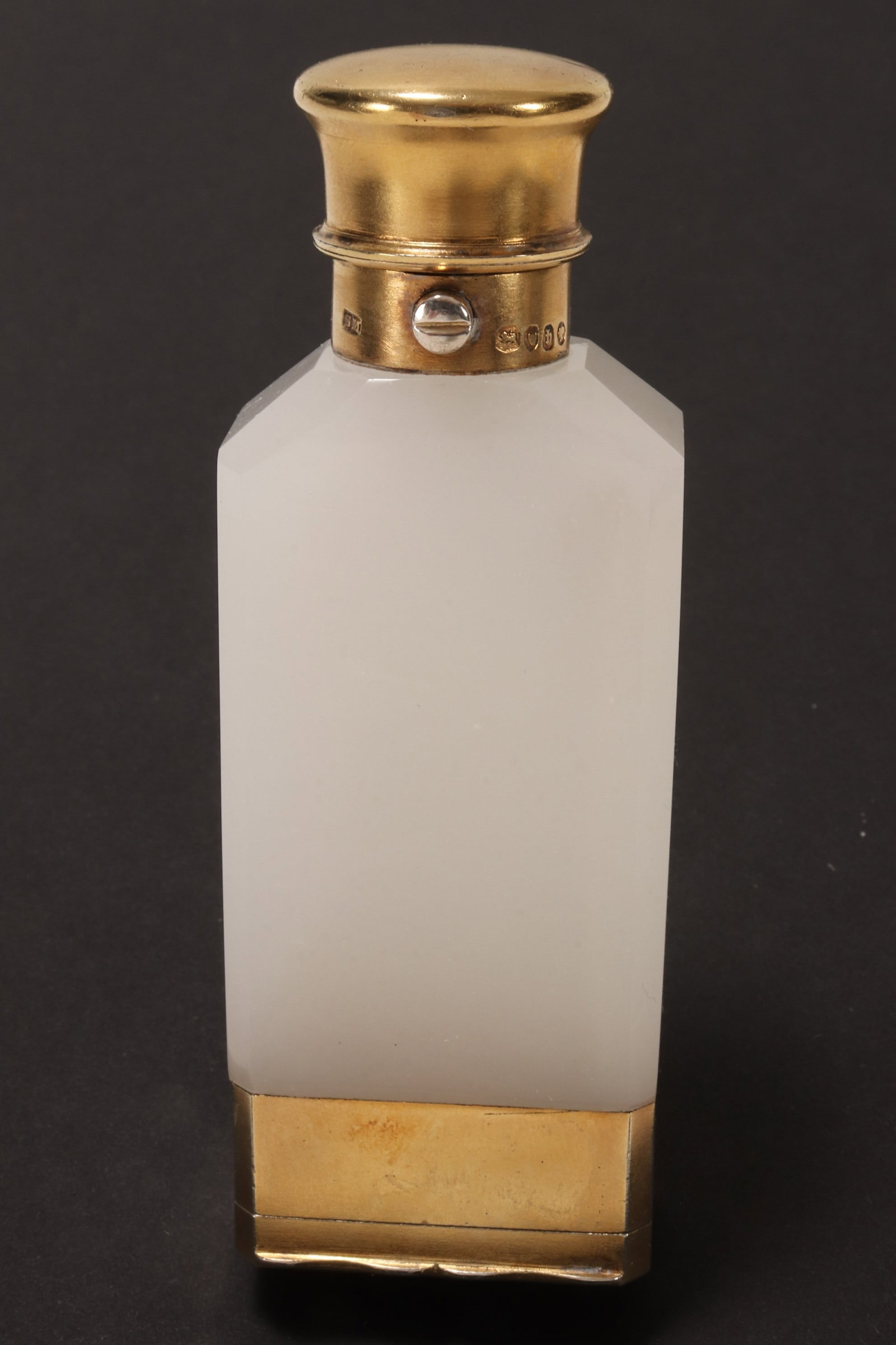 Beautiful Victorian Gilt Sterling Silver and Opaline Glass Combination Scent Bottle and: hallmarked London, 1863, Sampson Mordon & Co, of rectangular form with sloping shoulders, the cover with spring push button, with hinged lower section revealing a finely pierced grill, height 9.7cm