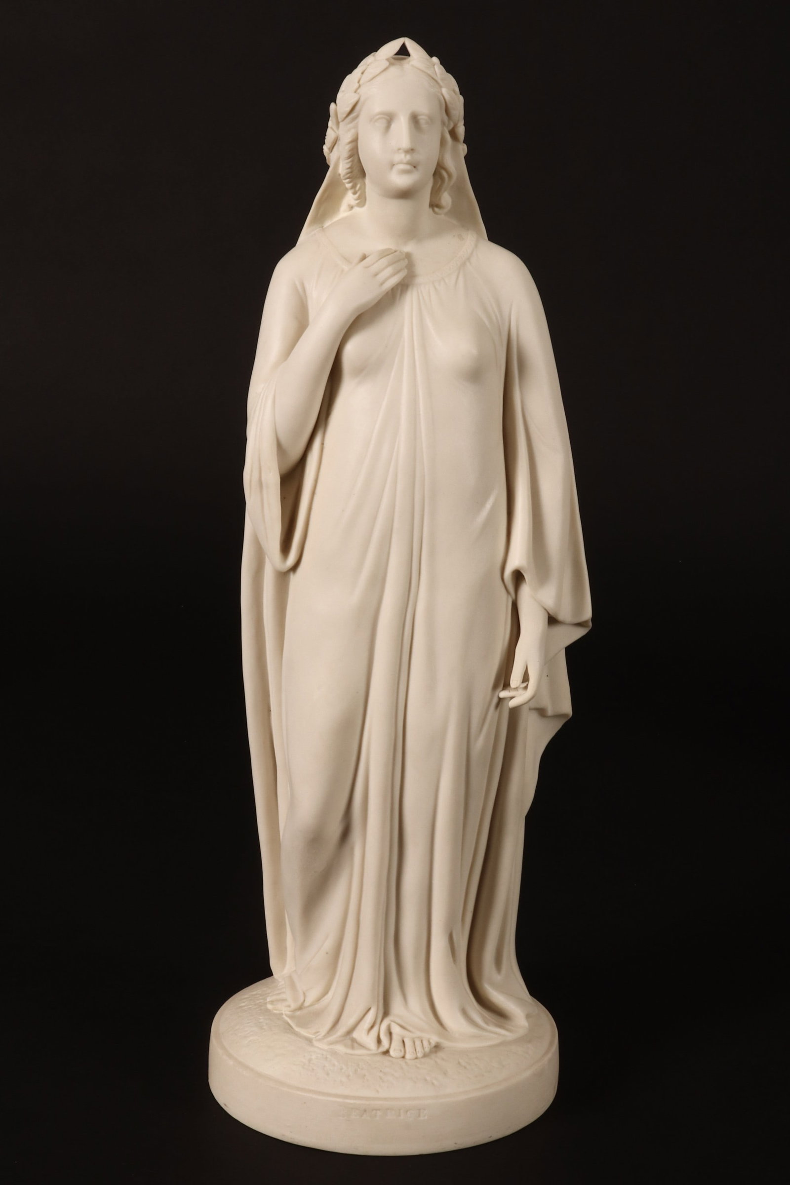 Large Victorian Parian Ware Figure,: depicting Beatrice, in flowing gown and wearing a laurel wreath, raised on a circular base, impressed Beatrice to base, height 44cm