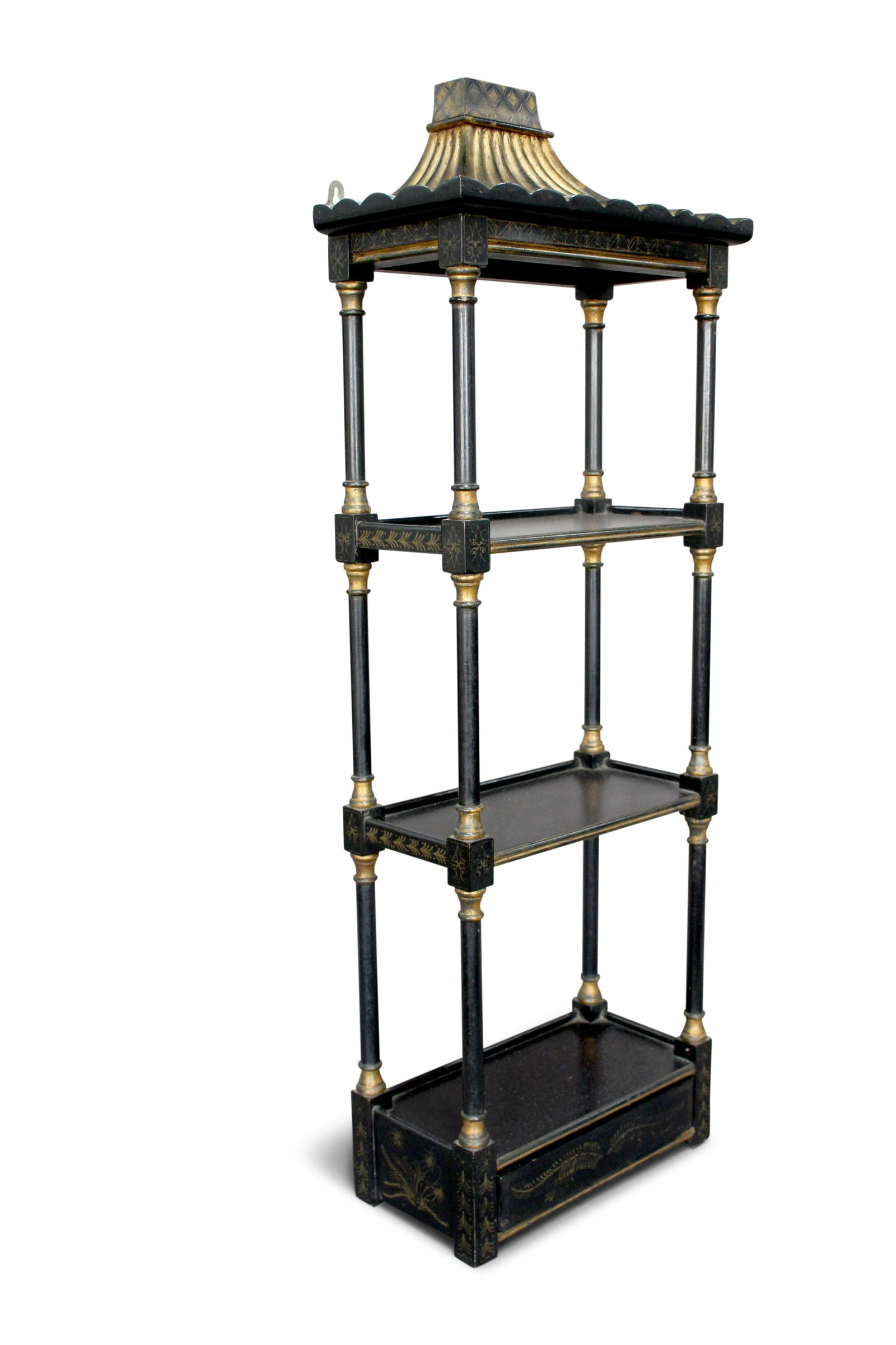 Regency Style Chinoiserie Wall Shelf,: in the form of a pagoda, with a spreading roof, above three shelves with turned supports, above a lower drawer, in a fine gilt and ebonised finish, 92cm x 33cm x 16.5cm
