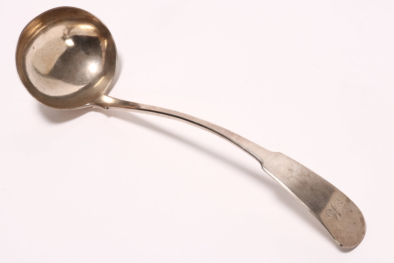 Scottish Provincial Victorian Sterling Silver Soup Ladle,: hallmarked Dundee, Thomas Shannon, active c.1866, in fiddle pattern, with engraved 'M' to terminal, total weight 243g, length 34cm