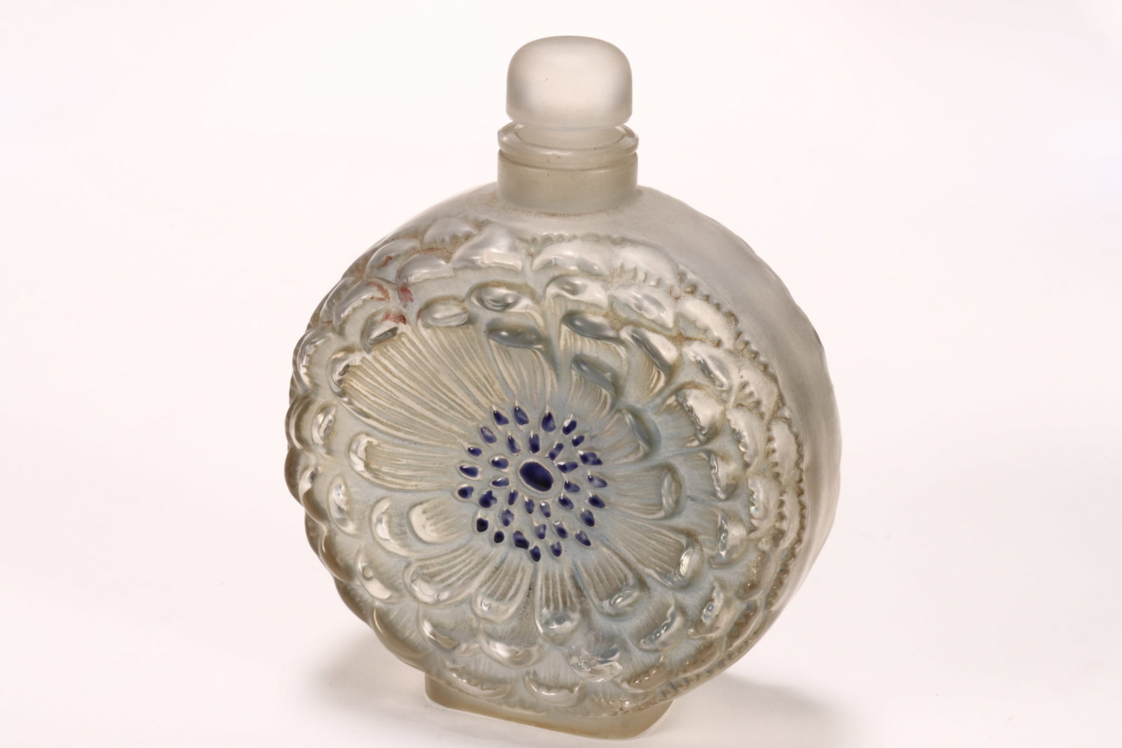 Rene Lalique 'Dahlia' Patinated Perfume Bottle, c.1931,: of pilgrim form, decorated with flower heads to each side, acid etched R. Lalique, height 13cm