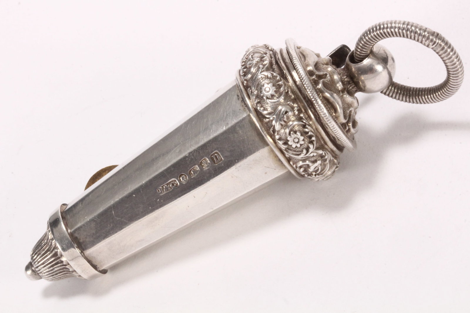 Victorian Sterling Silver Military Officers Whistle,: hallmarked Birmingham, 1852, Joseph Jennens & Co, with tapering facetted sheath accented with foliate decoration, with loop finial above a lower reeded and ball finial, total weight 42g, length 8.5cm 
