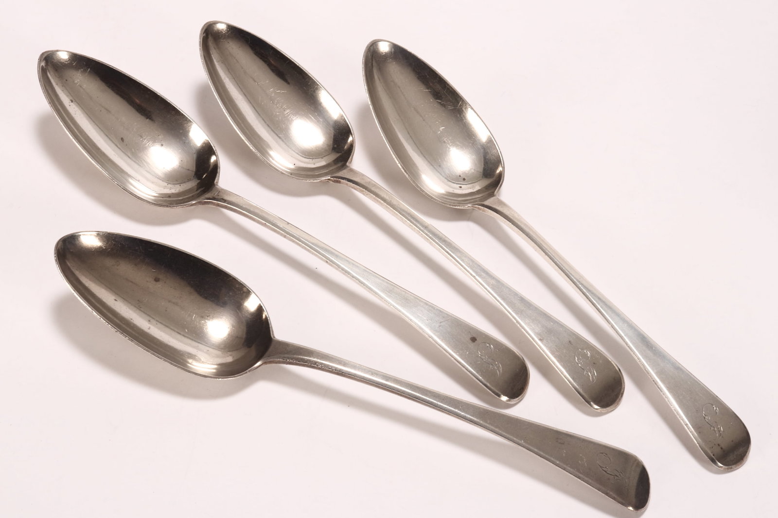 Four George IV Sterling Silver Table Spoons,: hallmarked London, 1829, WT, in Old English pattern, with engraved 'J' to terminal, total weight 285g, length 22cm (4)
