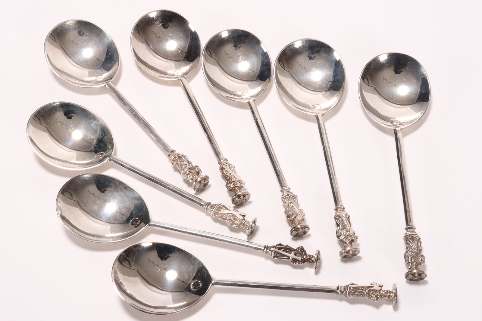 Eight Elizabeth II Sterling Silver Apostle Spoons,: hallmarked London, 1953, TB//&S (Thomas Bradbury & Sons Ltd), with fig shaped bowl stamped with coronation mark, total weight 564g, length 18.5cm (8)