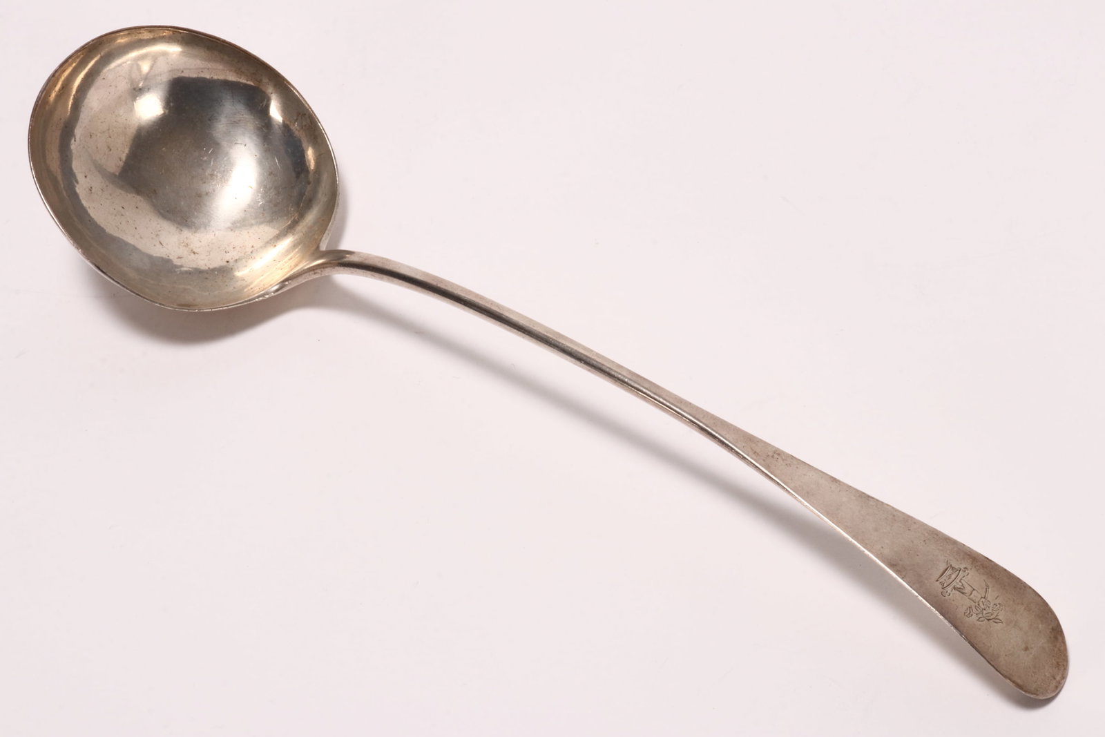 Scottish George III Sterling Silver Soup Ladle,: hallmarked Glasgow, Adam Graham, in Old English pattern with engraved crest to terminal, total weight 227gm, length 36cm