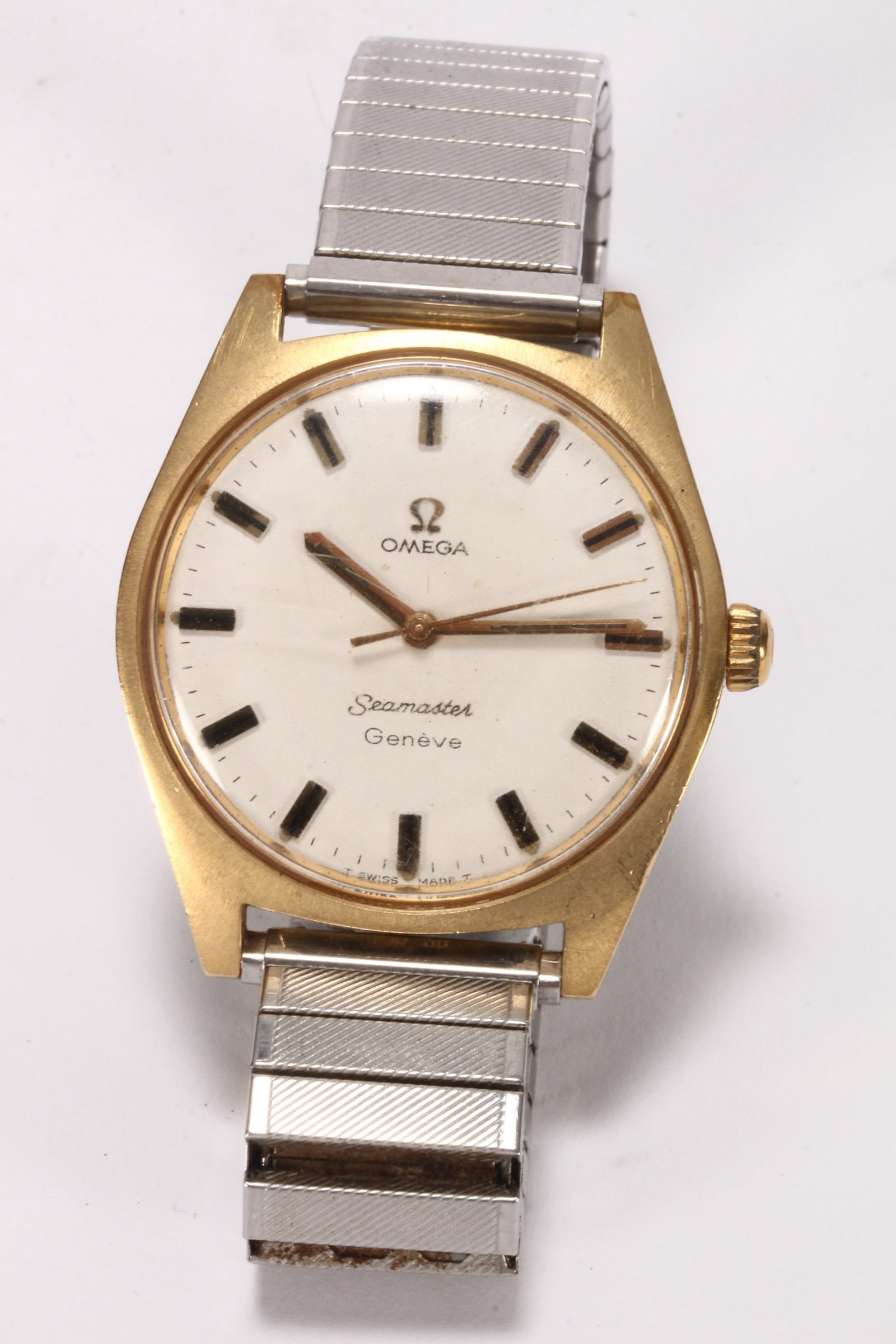Gents Omega Seamaster Geneve Wristwatch,: c.1968, model 135.041, with cal.601 17 jewel manual wind movement, #27004609, with brushed silver dial and baton hour markers, set within a 20 micron gold plated case of 35mm diameter, paired with a s