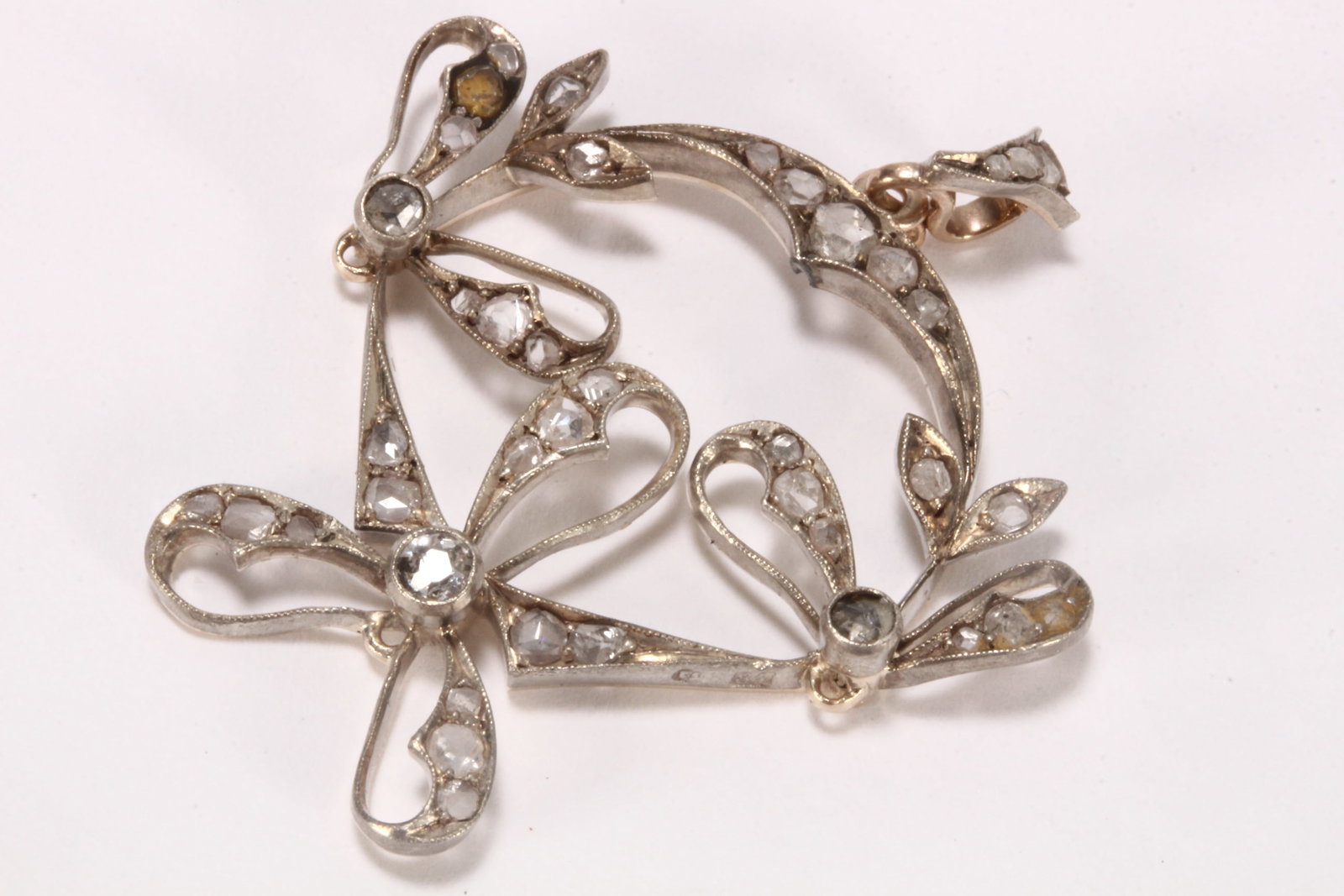 Russian 14ct Gold and Diamond Pendant,: early 20th century, stamped 56, of pierced foliate form, total weight 4.5g, drop 3.5cm x width 3.5cm