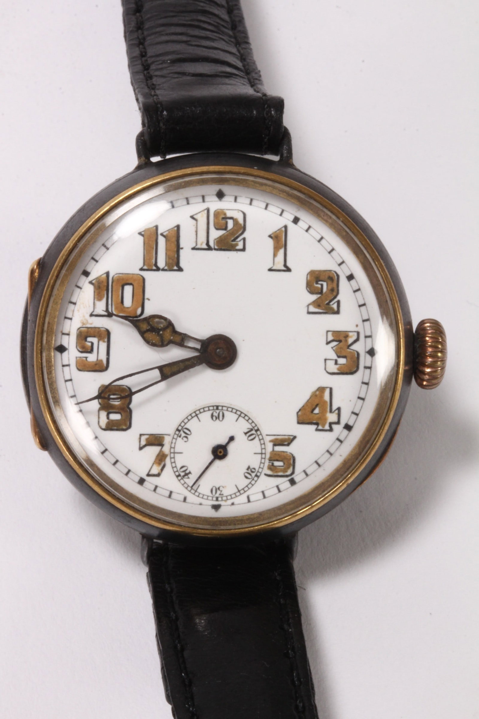 Rolex WWI Period Steel Trench Watch,: with signed manual wind movement, inner case back stamped 'Rolex Swiss', #760018, the white enamel dial with Arabic hour markers and cathedral hands, with subsidiary seconds dial to the six o'clock po