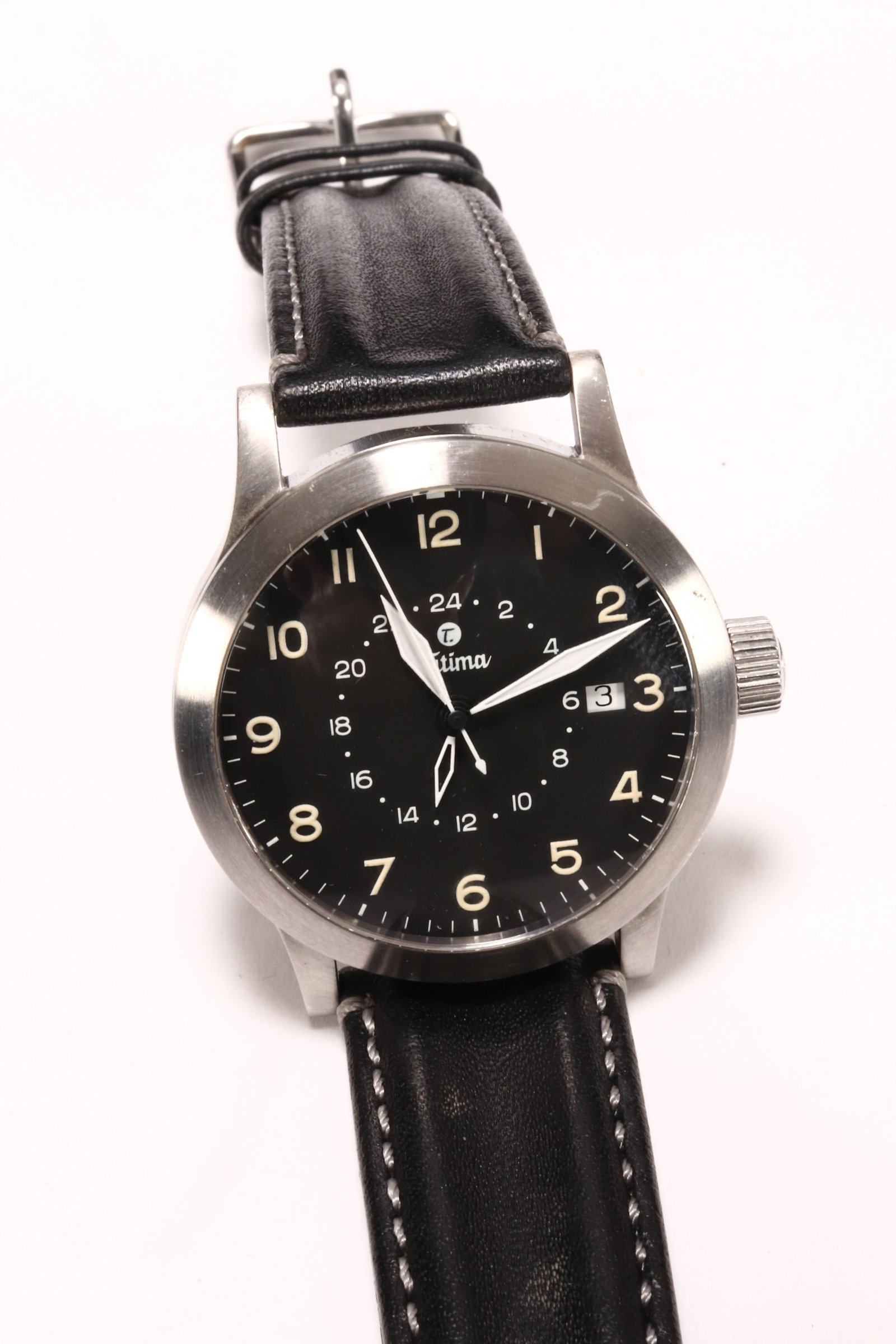 Tutima FX UTC Automatic Pilot's Wristwatch,: in stainless steel, model #632-01, serial #63211320, with Swiss ETA 2893-2 automatic movement, the black dial with Arabic hour markers, date window, lumed sword hands and UTC (second time zone) functi