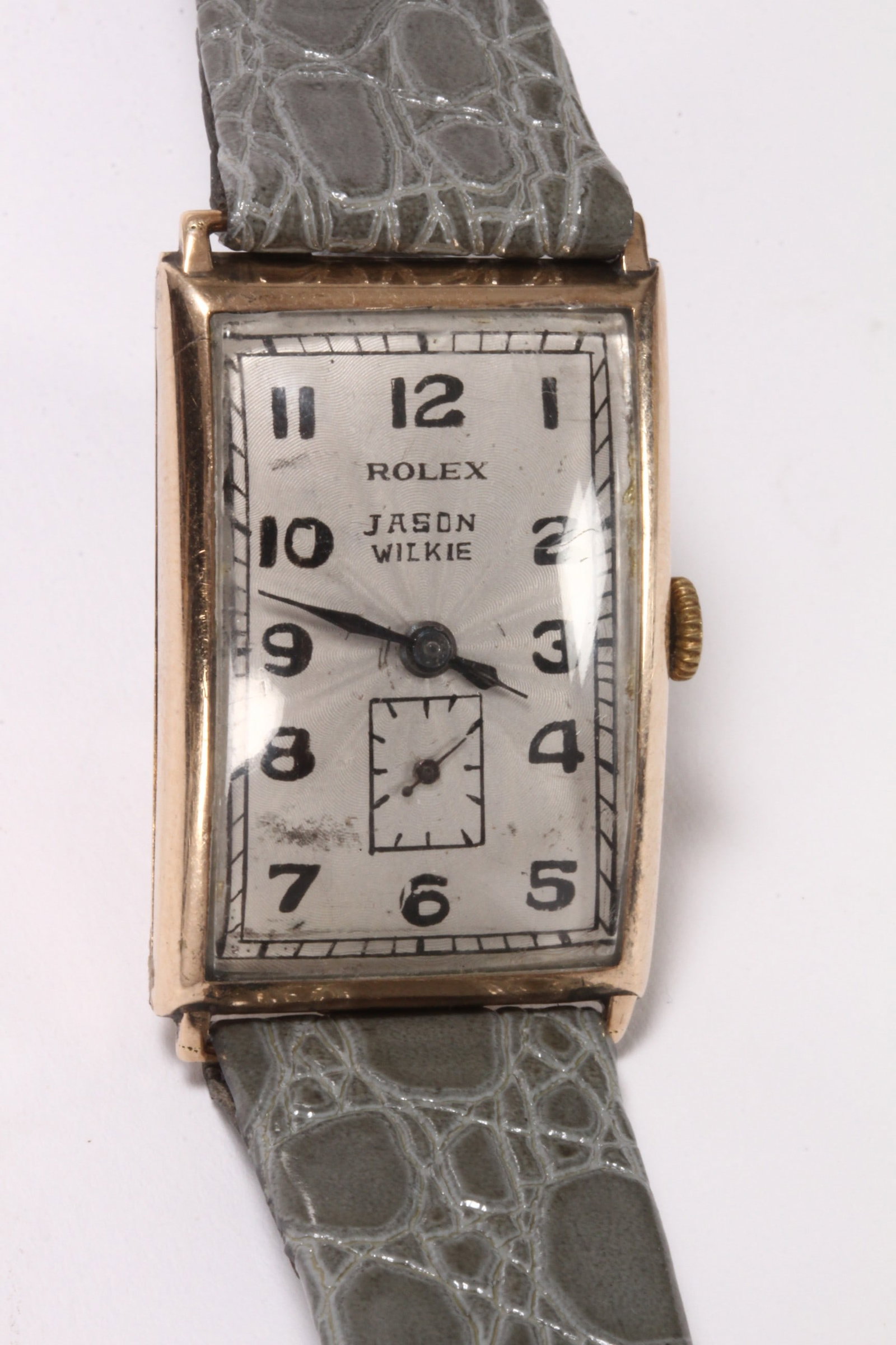 Gents 9ct Gold Rolex Wristwatch, c.1938,: stamped to inner case back 9/375, R.W.C Ltd, in 9ct gold rectangular contoured dial, case back stamped 757/43889, with Rolex prima 15 jewel manual wind movement, case diameter 22mm, lug to lug 36mm, w