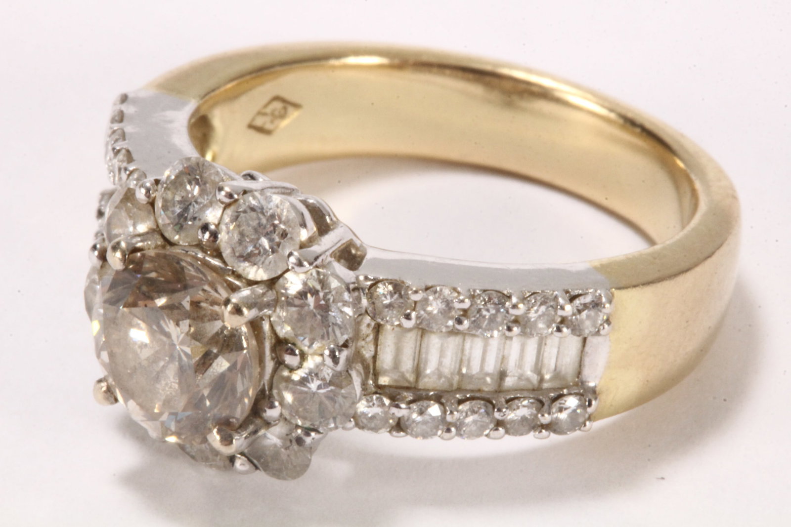 18ct Gold Diamond Cluster Ring,: stamped 750, with central claw set 1.26ct round brilliant champagne diamond, encircled by nine smaller round brilliant cut diamonds, the shoulders set with row of baguette cut diamonds set between row