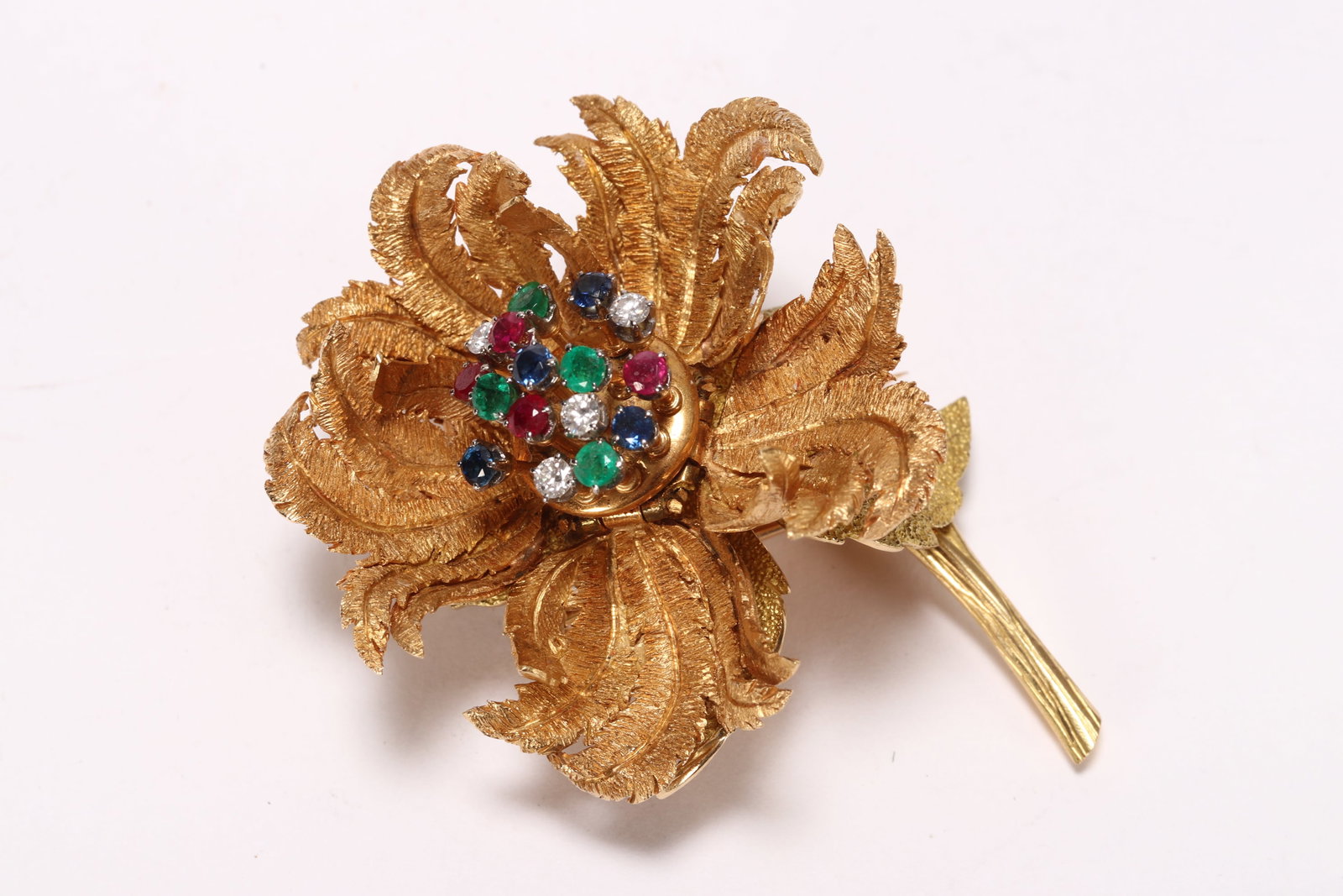 Exquisite French 18ct Gold Multi Gem Set Brooch,: c.1950s, stamped France, 18kt, of articulated flower form, the finely modelled petals on hinged mounts, encircling a gem set centre mimicking stamen protrusions, the claw set terminals containing roun