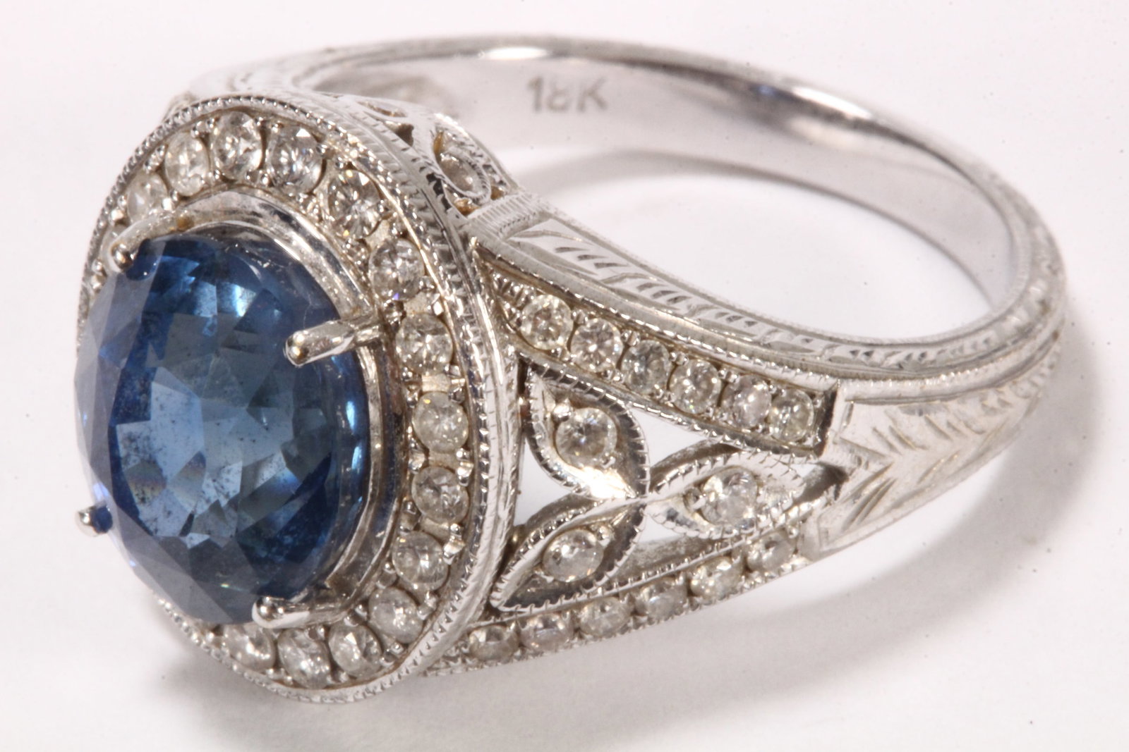 Stunning 4.72ct Ceylon Sapphire Ring,: in 18ct white gold, the natural sapphire of oval modified brilliant cut, of dimensions 9.50mm x 8.19mm x 7.07mm, the GRS gemstone report indicating no indication of thermal treatment, on an 18ct white
