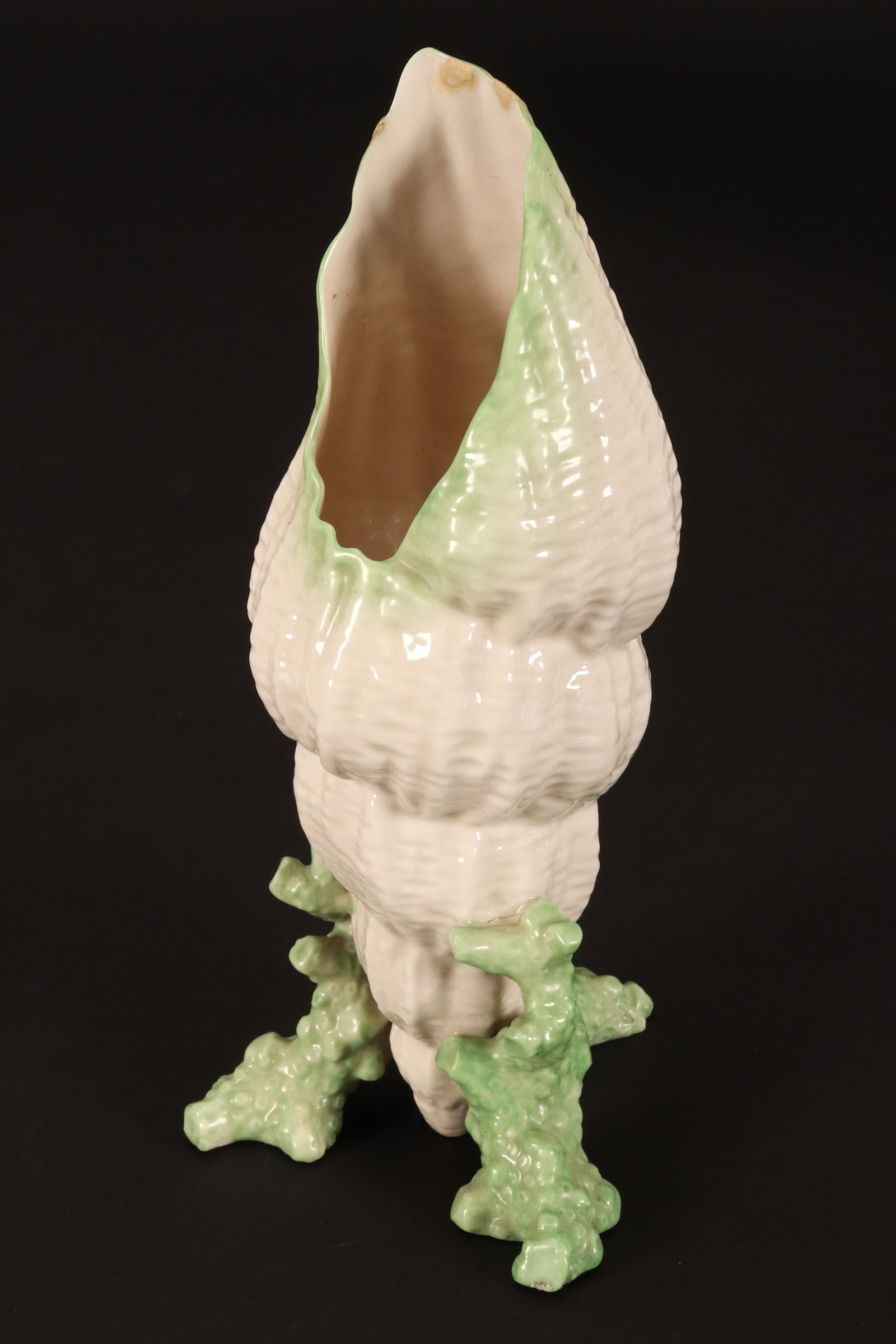 Belleek 2nd Mark Porcelain Shell Vase,: c.1891-1926, modelled upright on coral support, in tones of green and cream, a/f (small repairs to top), height 22.5cm