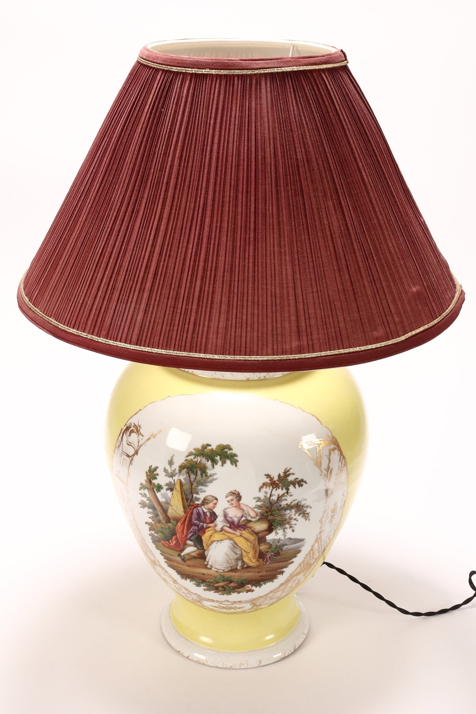 Large 19th Century Dresden Porcelain Lamp,: of baluster form, decorated with two scenes containing figures in an outdoor setting, surrounded by a border of flowers, foliage and geometric patterns, in tones of green, white, brown and purple on a