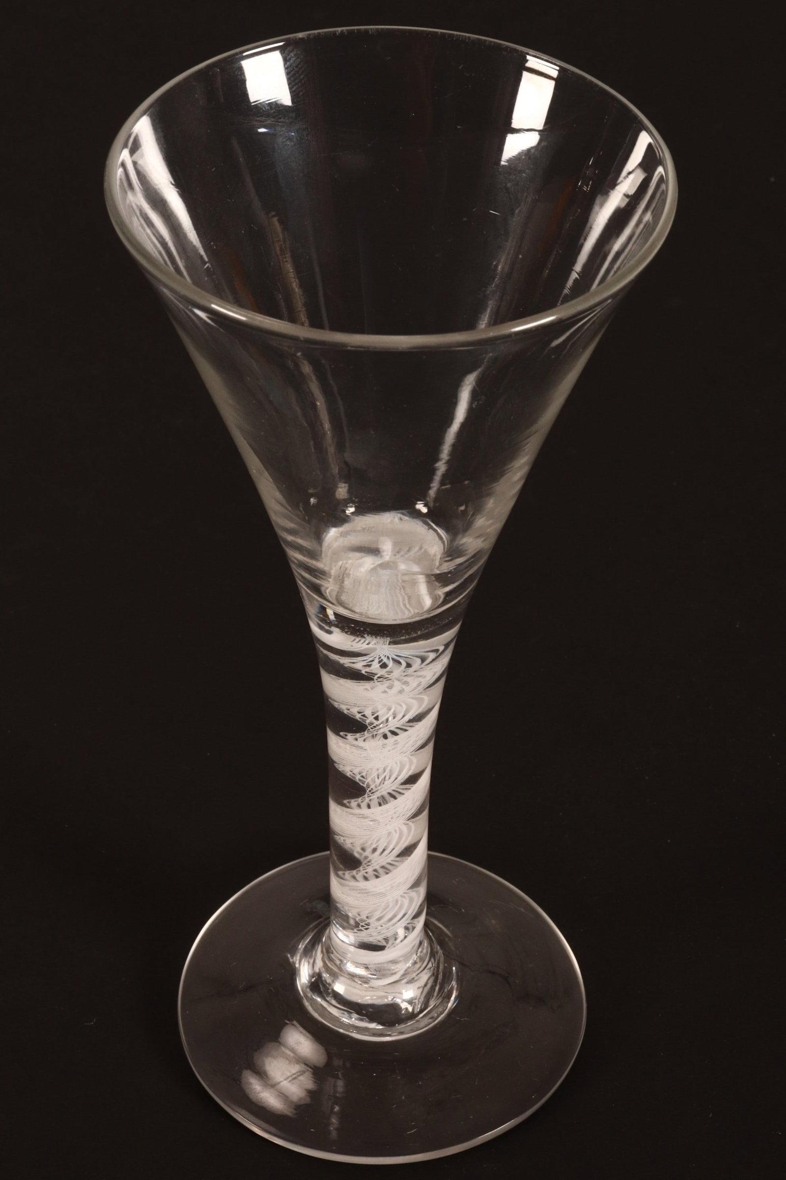 18th Century British Opaque Twist Ale Glass, c.1750,: with a conical bowl, above heavy stem with central corkscrew twist and spiral surround, on a circular foot, height 17.5cm