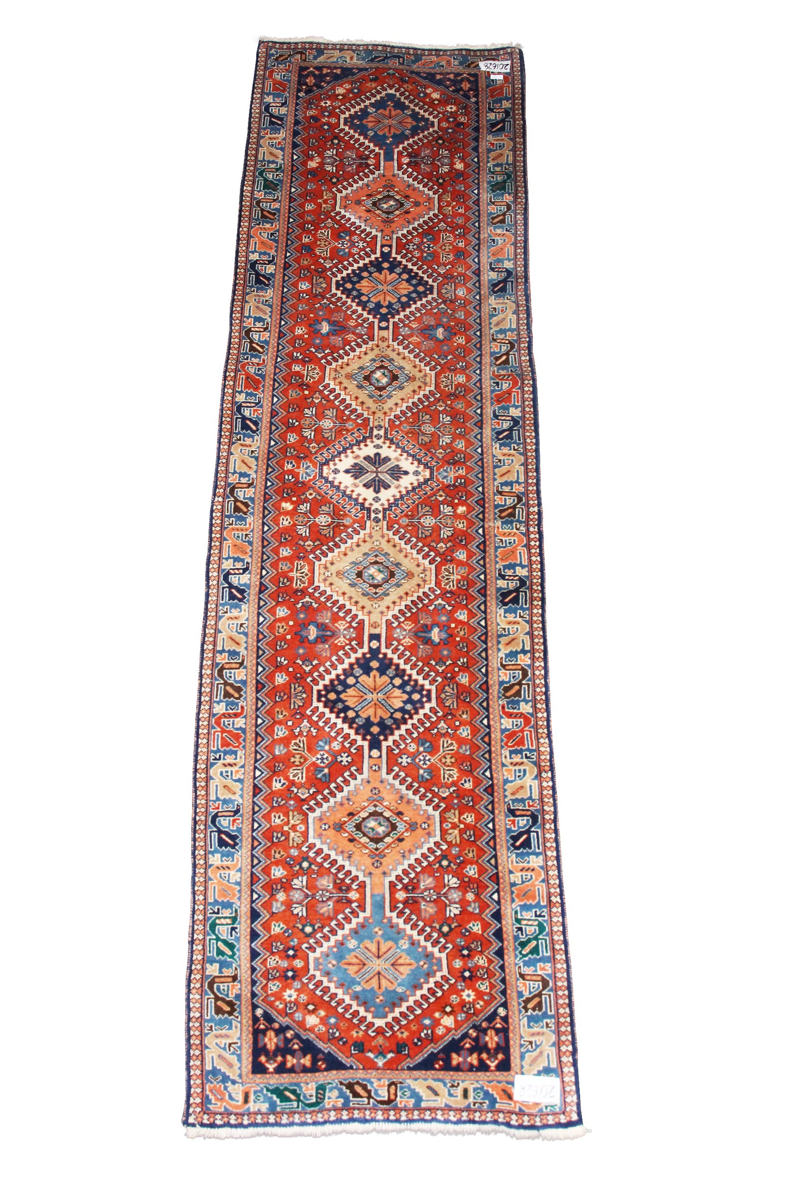 Persian Yalameh Hall Runner,: of rectangular form, set with nine central diamond medallions, on a stylised floral ground, surrounded by a border of stylised birds, in tones of green, red, orange and blue, 307cm x 82cm