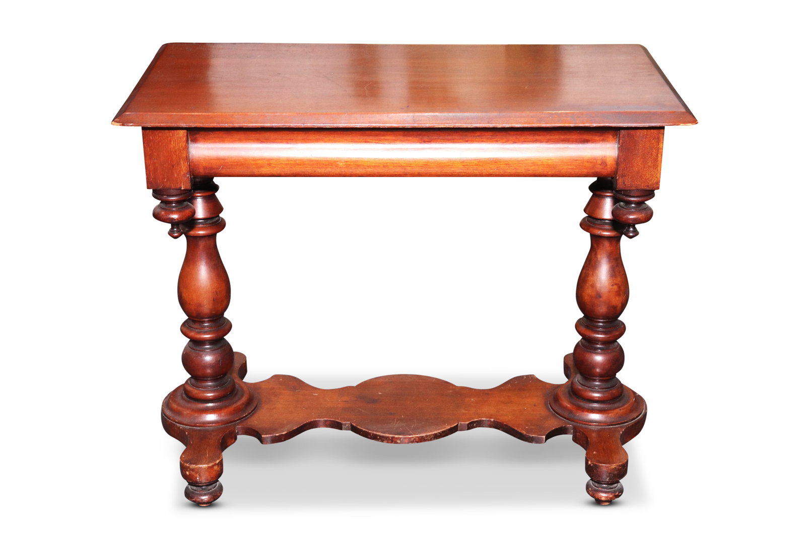 Australian Colonial Cedar Hall Table,: with a rectangular top, set with four turned reverse finials to the corners, above a pair of turned supports, united by a shaped apron, on four bun feet, 74cm x 92cm x 51cm
