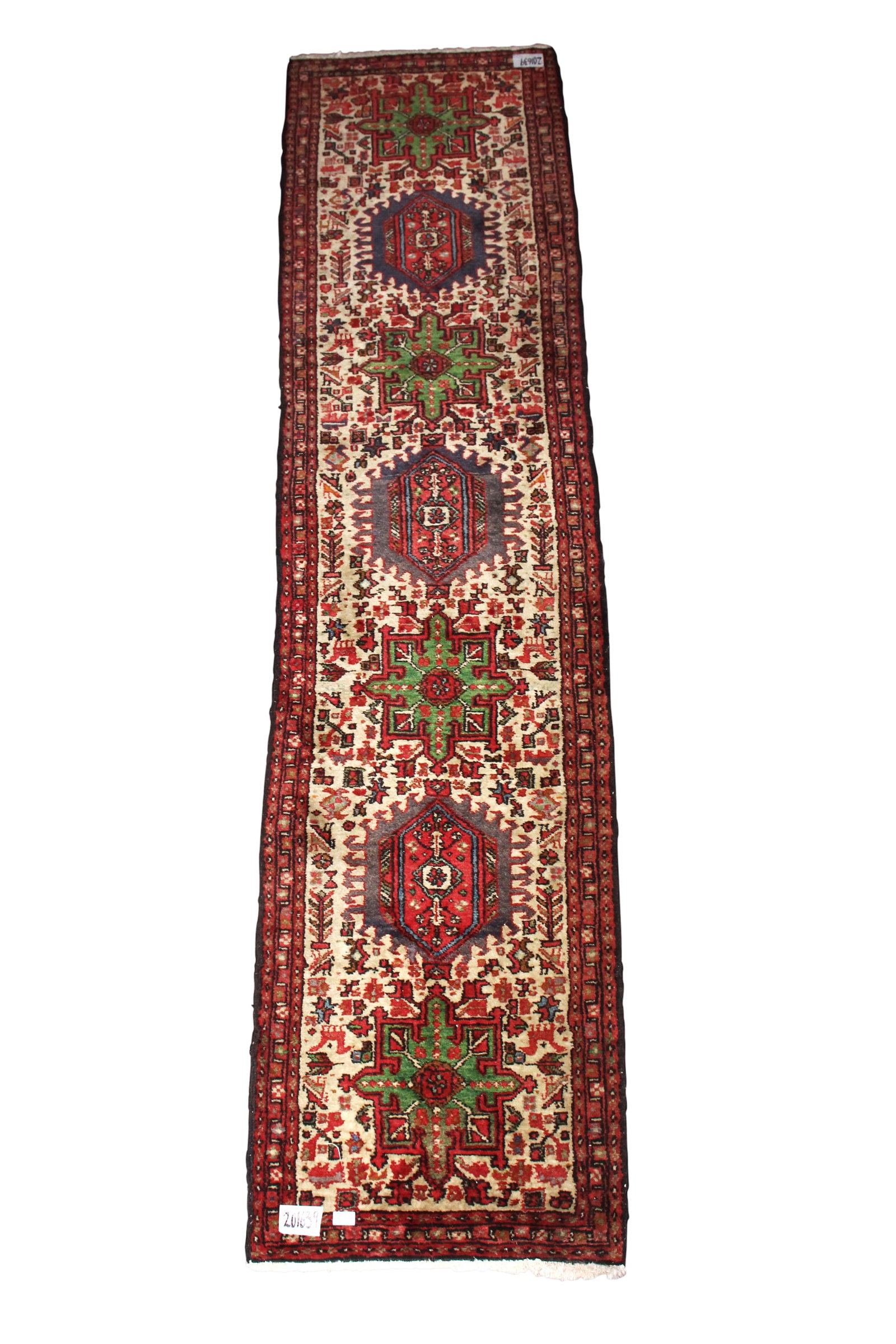 Persian Qarajeh Runner,: of long rectangular form, set with seven alternating medallions, surrounded by stylised floral and bird motifs, in tones of blue, green and red, 292cm x 70cm
