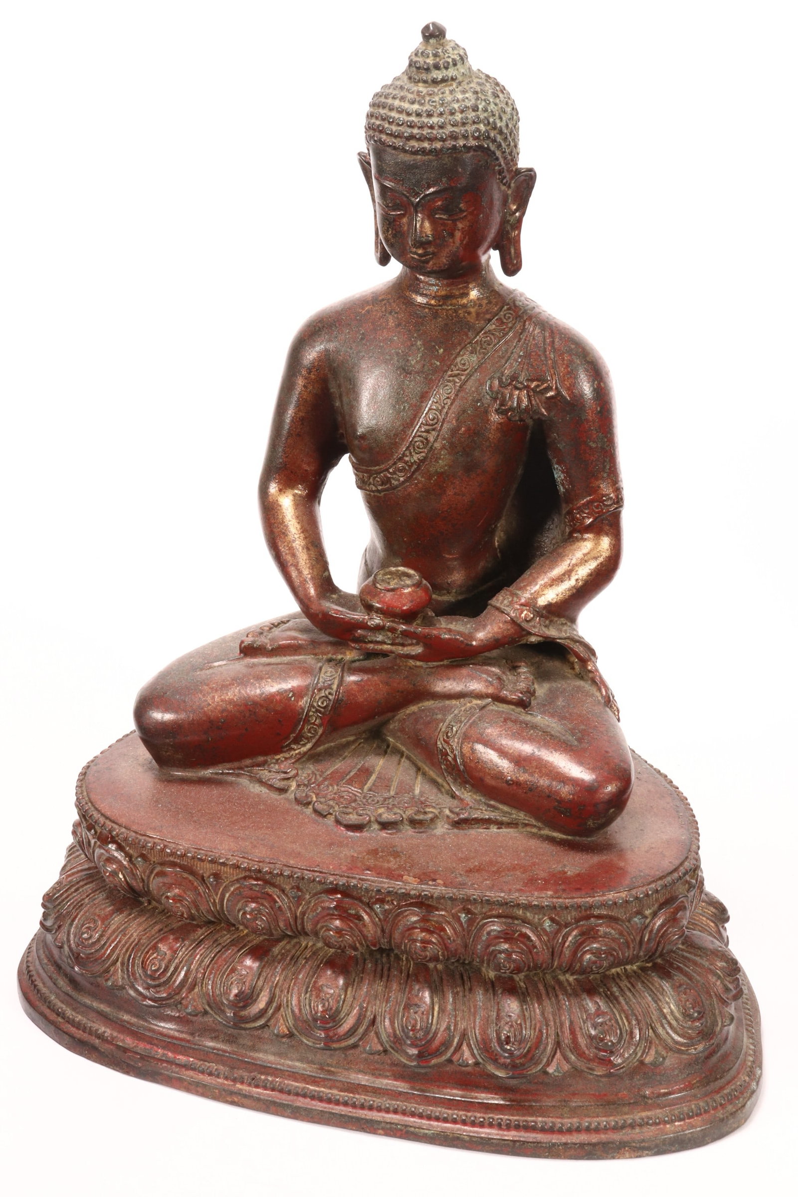 Sino-Tibetan Lacquered Bronze Buddha,: depicted seated with a downwards gaze, shown holding an attribute with both hands, raised on a double lotus base, height 28cm