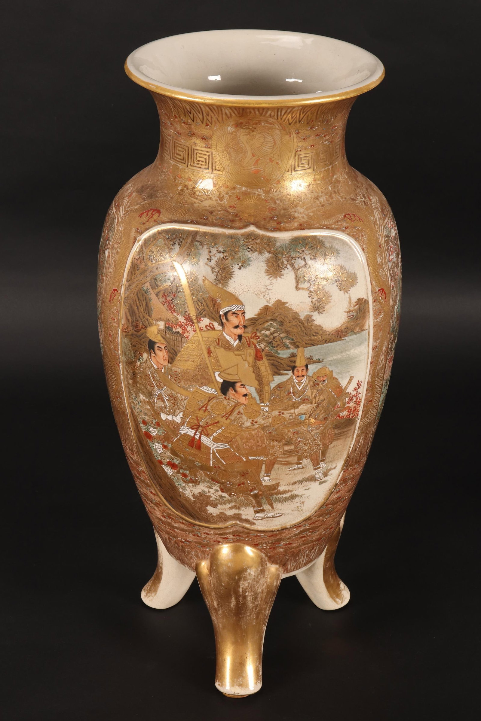 Large Satsuma Footed Vase,: of handsome proportions, with a spreading lip, above a series of panels decorated with samurai alternating with eagles, surrounded by a dragon brocade, in rich tones of gilt, red, blue and white, the 