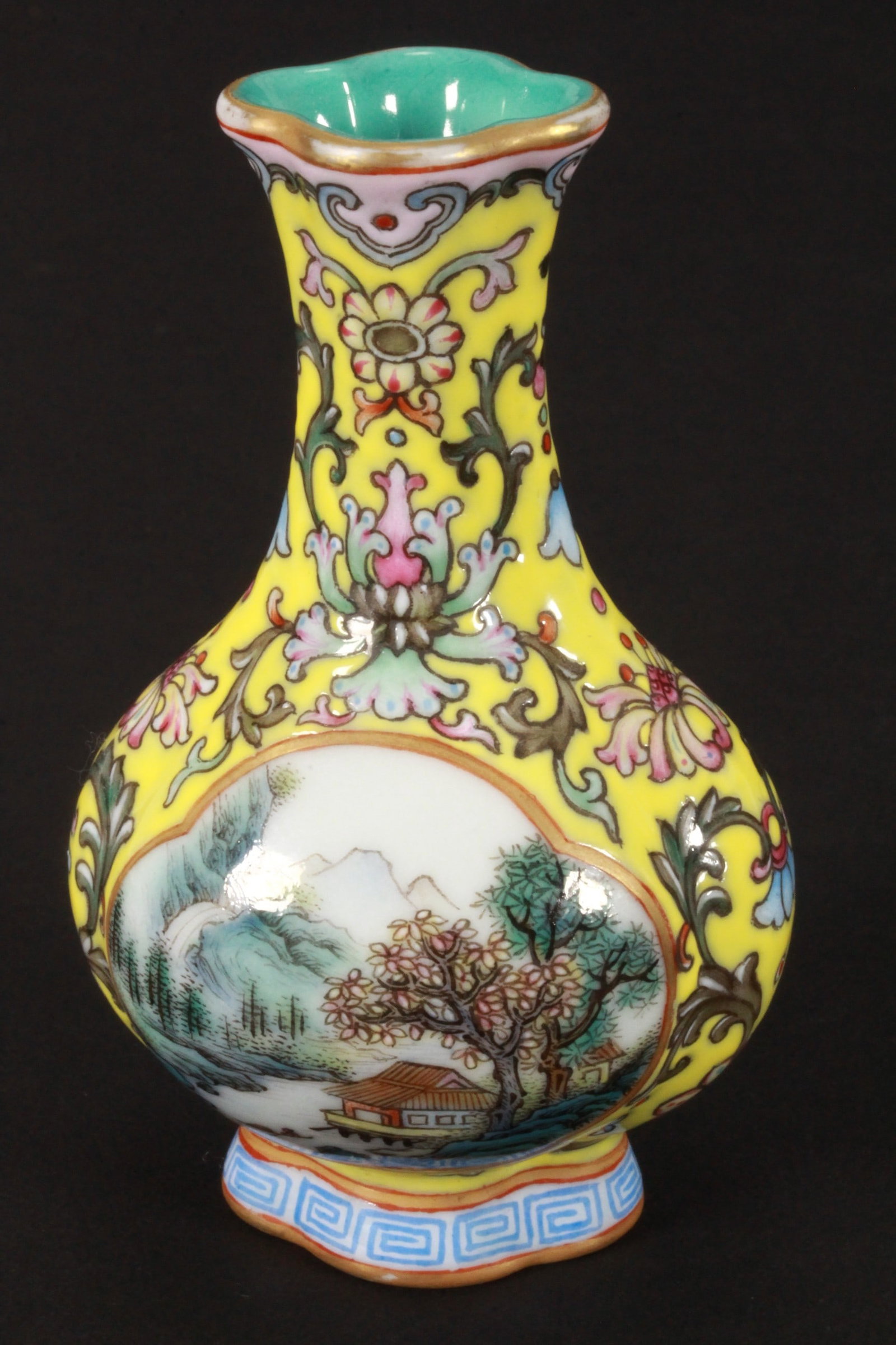 Chinese Miniature Porcelain Vase,: of lobed baluster form, decorated with floral and landscape medallions, surrounded by lotus and scrolling foliage, in tones of green, pink, blue and brown on a yellow ground, standing on a raised foot