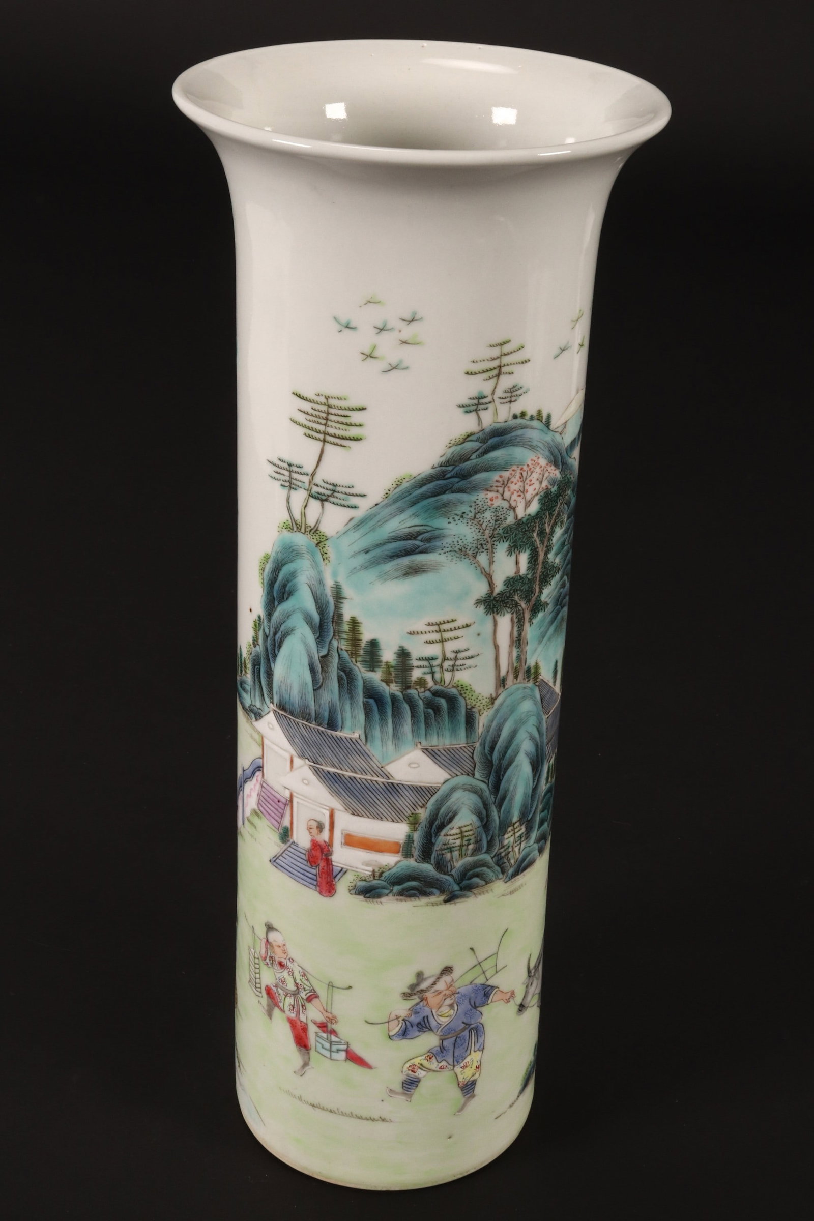 Chinese Late Qing Dynasty Porcelain Vase,: of cylindrical form with a flared rim, decorated with continuous scene depicting figures in daily life, in tones of blue, green and purple, height 32cm