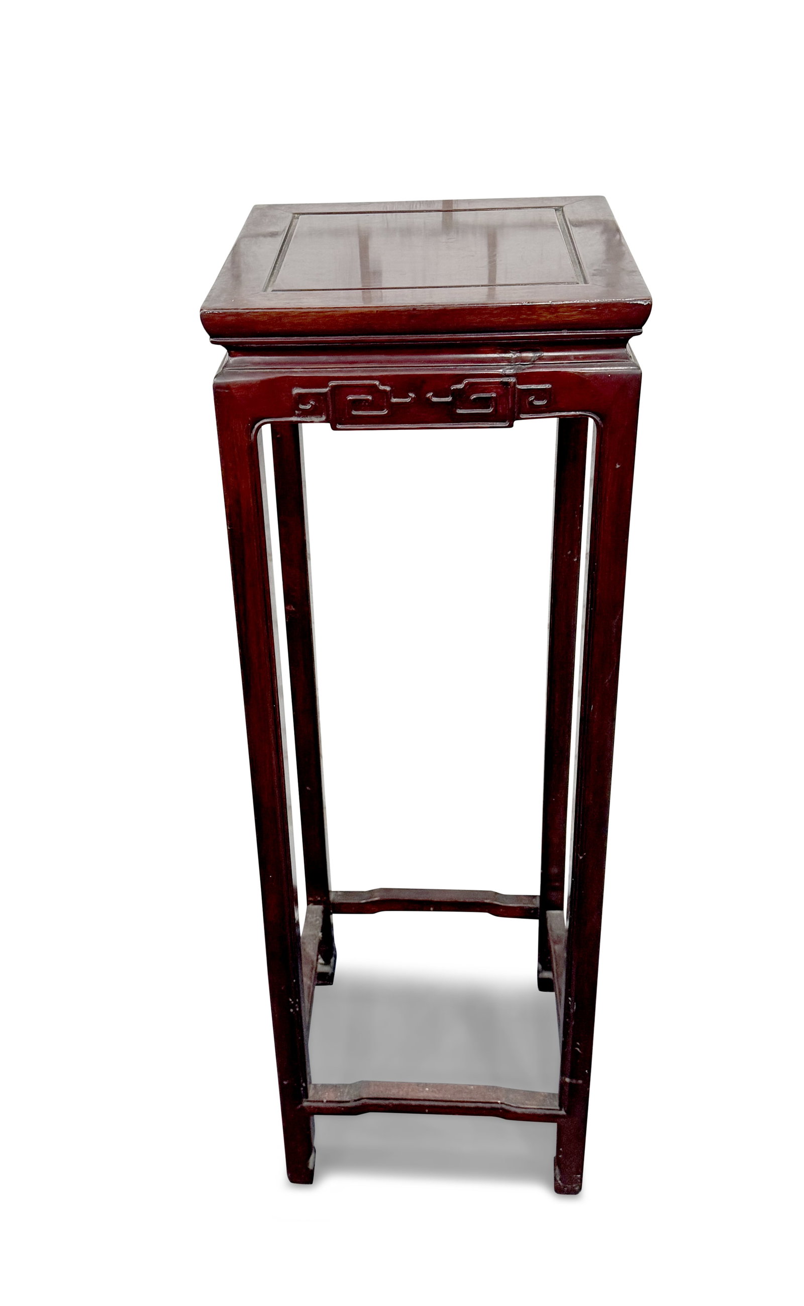 Chinese Rosewood Torchere,: with a square top above a carved apron, on four facetted legs and united by stretchers, 91cm x 30.5cm x 30.5cm