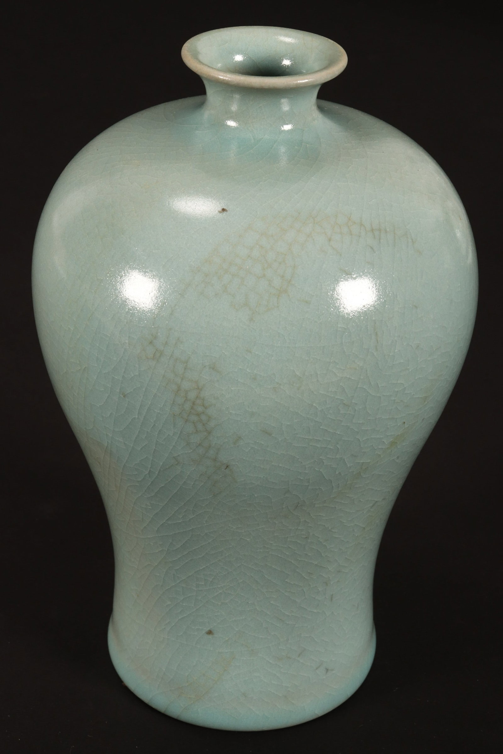 Chinese Celadon Vase,: of meiping form with everted rim, with five spur marks to base, height 19cm