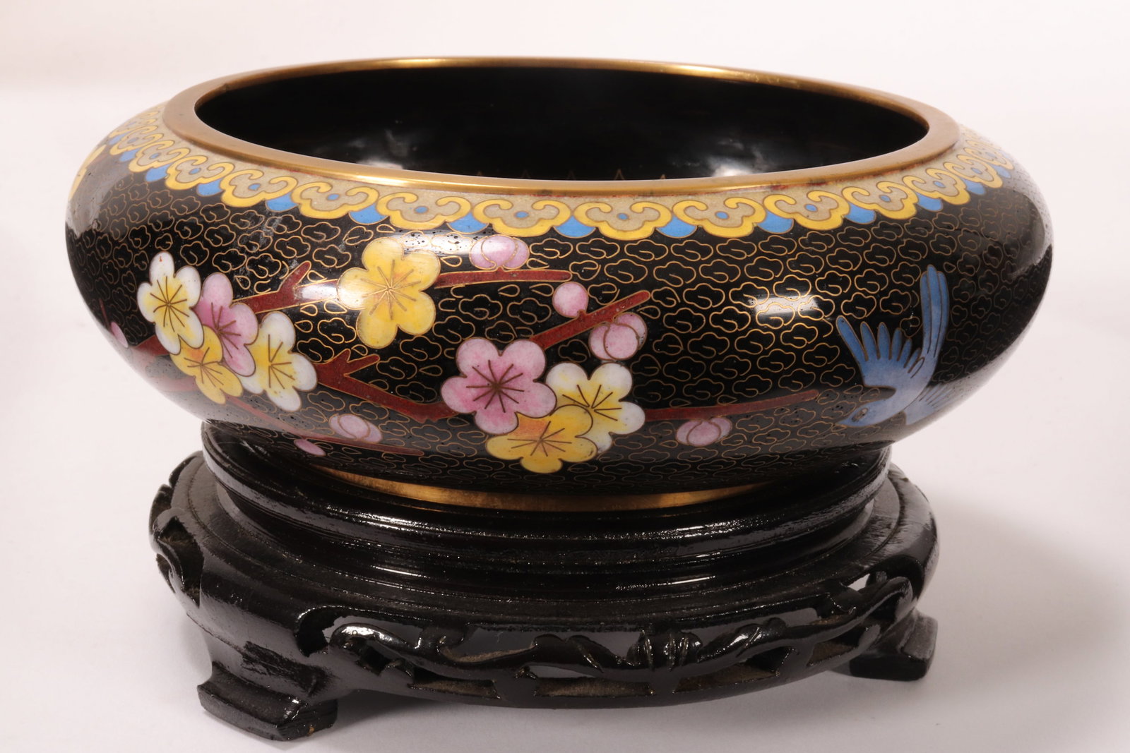 Chinese Cloisonne Brush Washer,: of deep bulbous form, with inverted rim, the whole decorated with swallows in flight amongst blossoming branches, flanked by decorative borders, in tones of blue, yellow, white, pink and brown on a bl