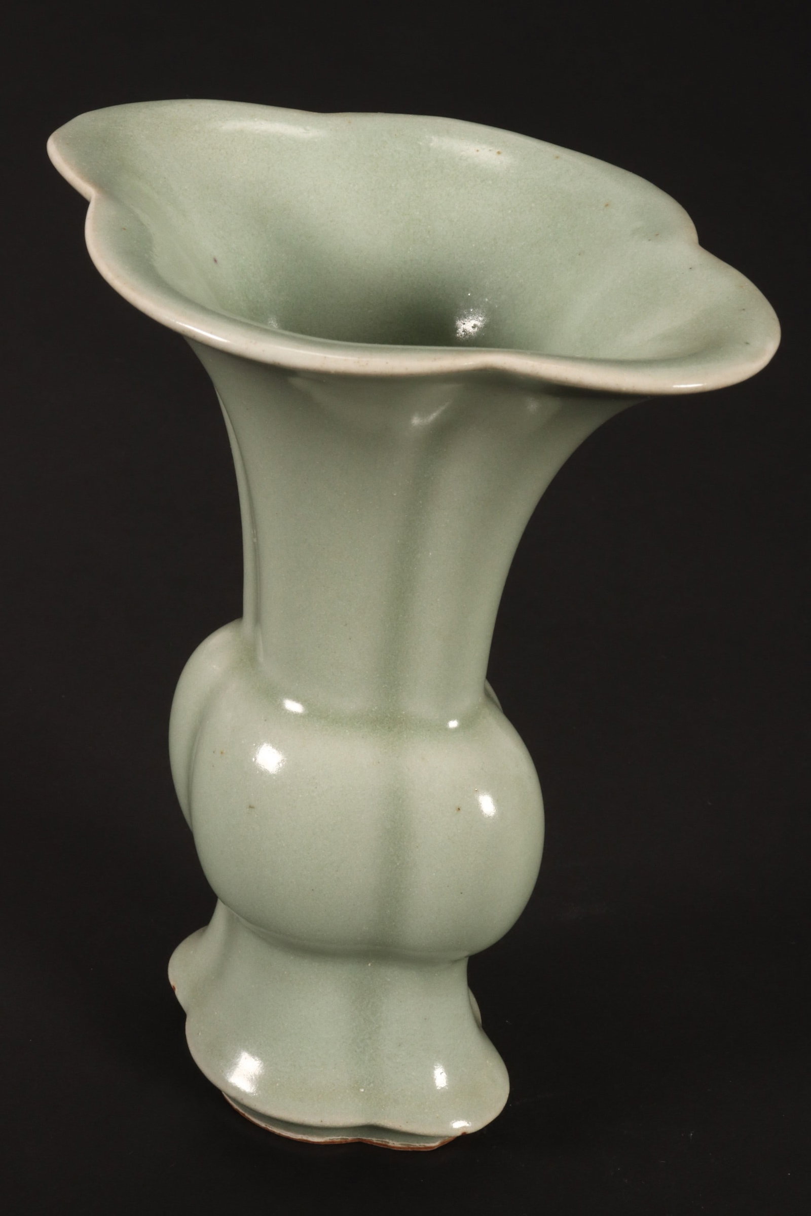 Chinese Celadon Gu Vase,: of lobed form, in a pale green glaze, height 15cm