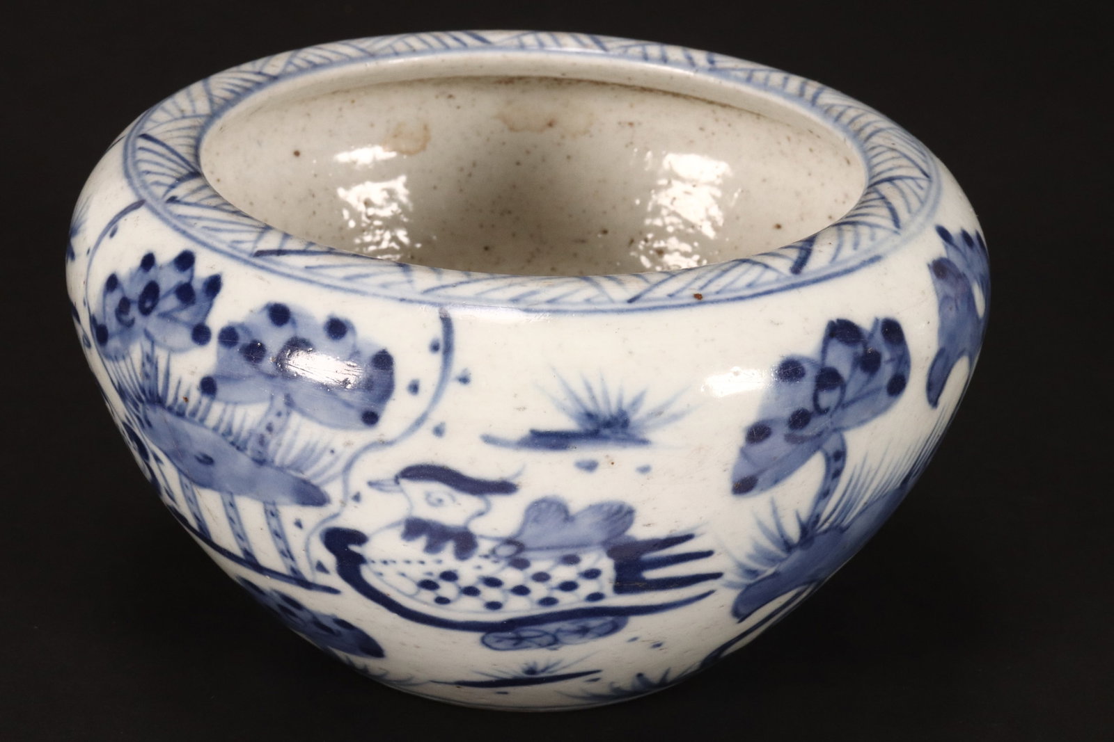 Petit Chinese Blue & White Porcelain Jardiniere,: of tapered form, decorated with a continuous scene of flowers, foliage and duck, height 8cm and diameter 14cm