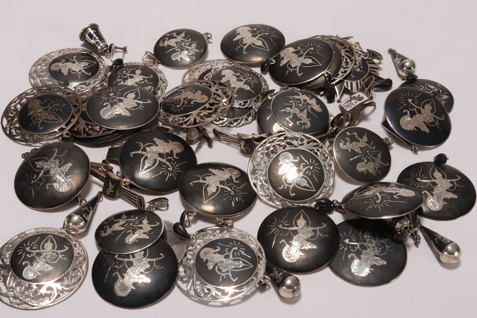 Large Quantity of Thai Sterling Silver Jewellery,: mark Siam, sterling, 925, comprising pendants, brooches and earrings, total weight 441g (qty)