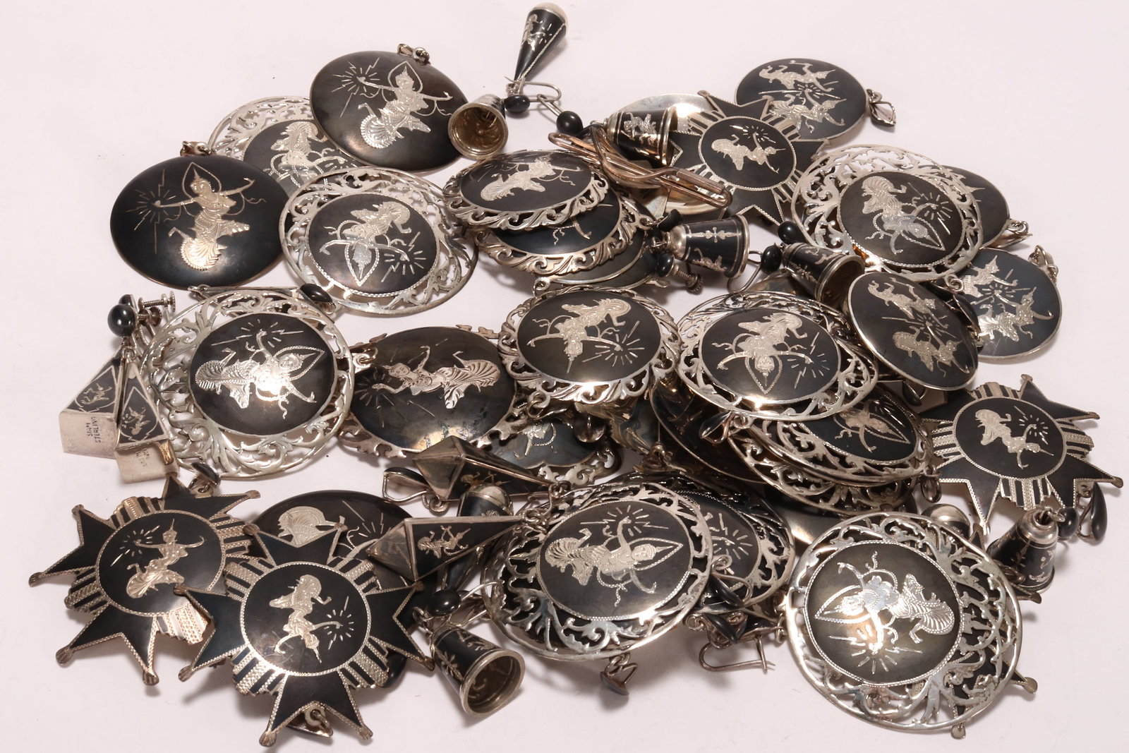 Large Quantity of Thai Sterling Silver Jewellery,: mark Siam, sterling, 925, comprising pendants, brooches and earrings, total weight 443g (qty)