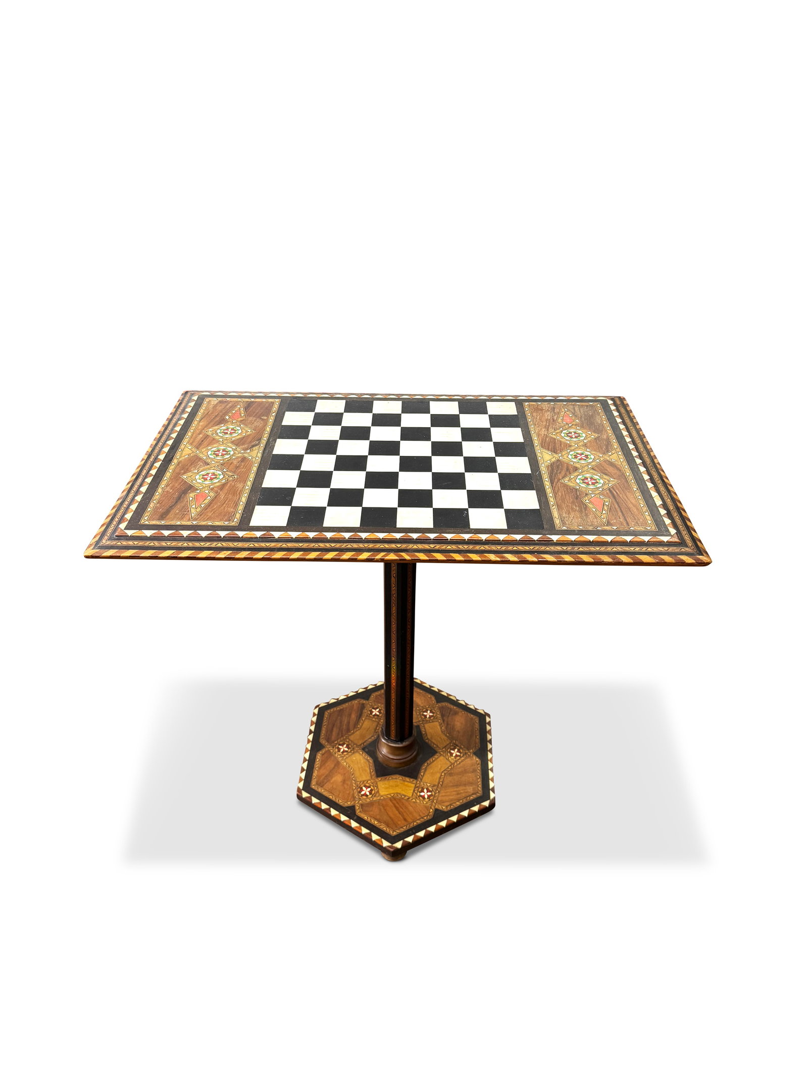 Indian Vizgapatam Chess Table,: the rectangular top with central chess board flanked by geometric inlay, above two drawers to each end, on slender fluted support on hexagonal base with bun feet, together with carved horn chess piece