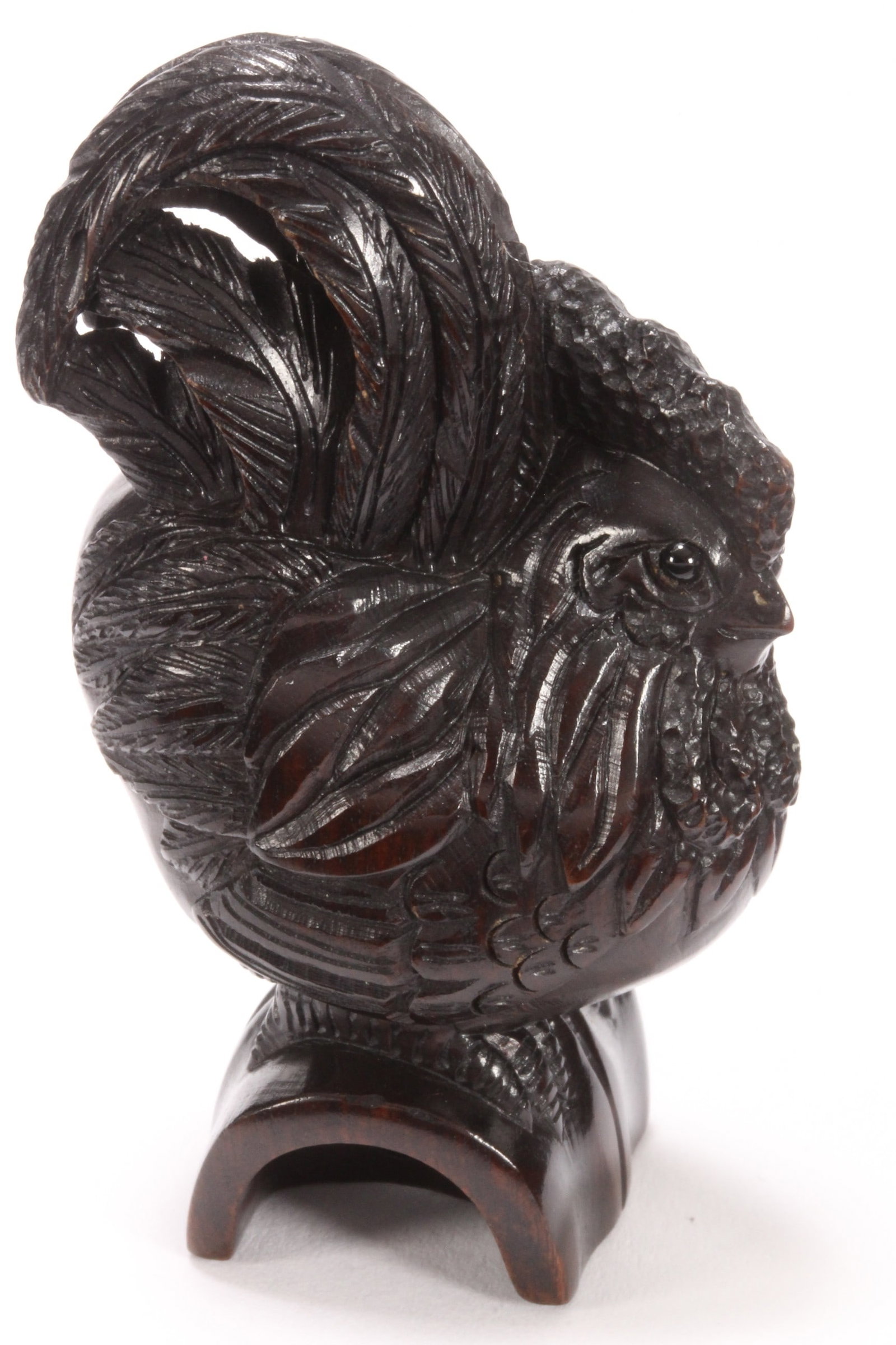 Japanese Carved Wooden Netsuke,: in the form of a perched rooster, with incised naturalistic detail to the feathers, two character mark to body, height 6.3cm