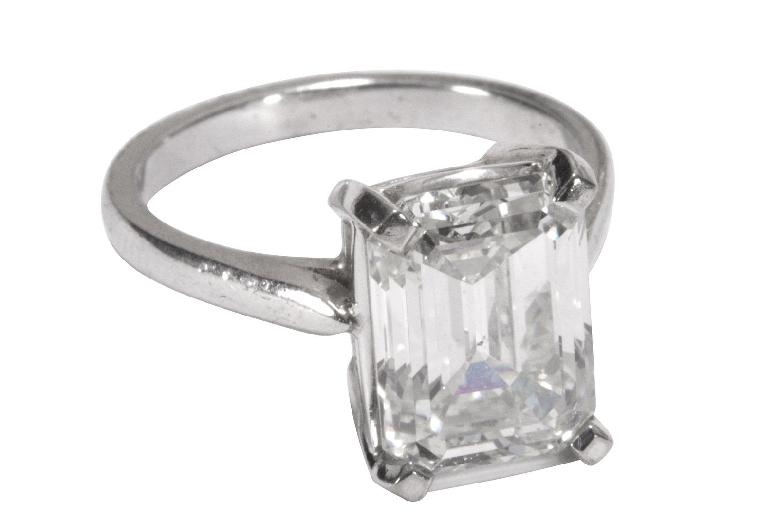 5.13ct Emerald Cut Diamond White Gold Ring,: four claw set with a stunning 5.13ct emerald cut diamond, colour G/clarity SI1, with nil fluorescence, showing excellent polish and very good symmetry, includes HRD Antwerp Institute of Gemology Diamo