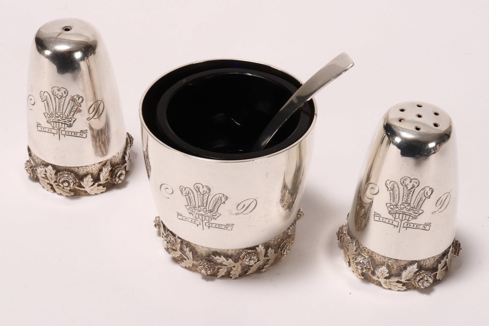 House of Lawrian Sterling Silver Three Piece Cruet Set of Royal Interest,: in thick and heavy gauge silver, comprising pair of salt and pepper shakers hallmarked London, 1979, HOL (House of Lawrian), designer Christopher Lawrence (born 1936), of tapering polished form, the b