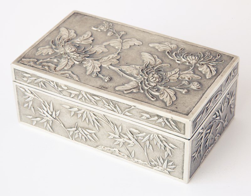 Chinese Late Qing Dynasty, Export Silver Box and: Cover, by Wang Hing & Co, of rectangular form, decorated with peony and bamboo, impressed W.H and characters to base, 5.3cm x 13cm x 8cm