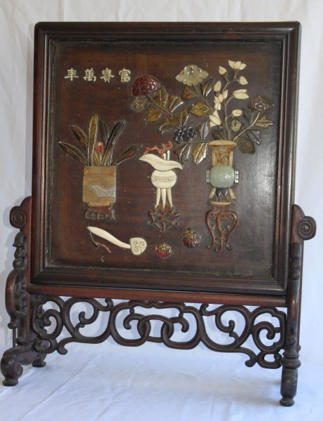 Chinese Late Qing Dynasty Screen Panel and Stand,: of square form, the panel decorated with an image of various vases on stands with flowers, in ivory, coral, jade and mother of pearl, the whole on a carved and pierced stand, a/f, 63cm x 54cm