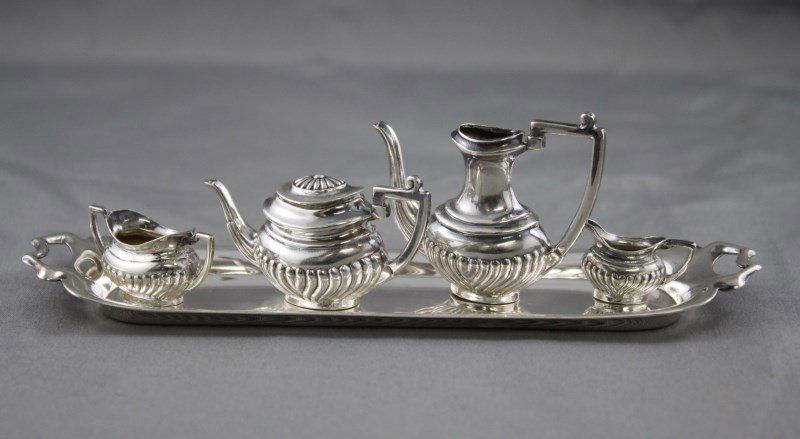 English Sterling Silver Miniature Five Piece Tea: Set, comprising teapot, coffee pot, creamer, sugar bowl and tray (5)